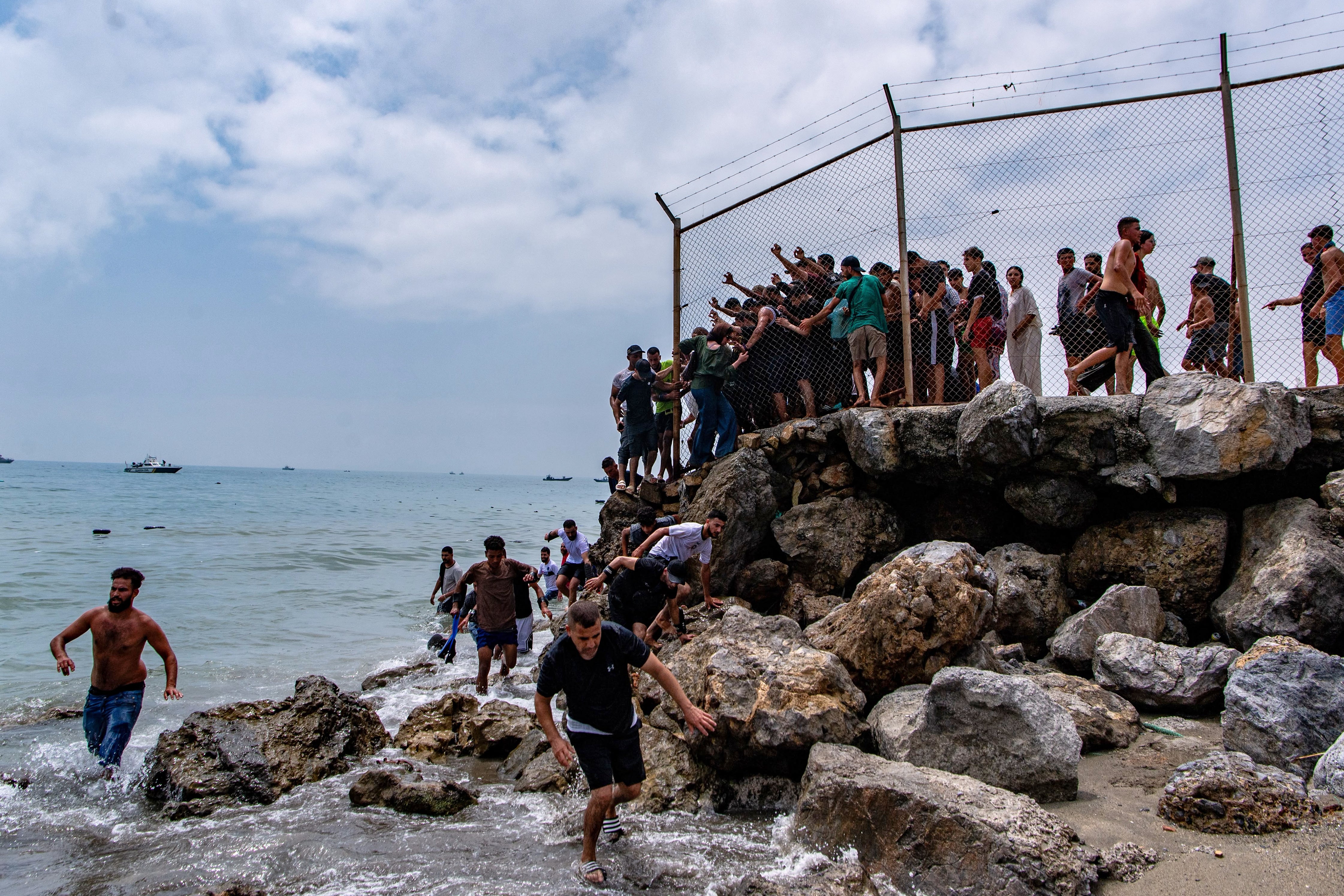 Spain will send troops to Ceuta after thousands of African migrants arrive from sea