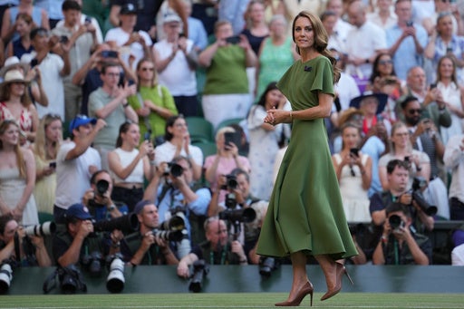 Princess Kate wore a grass-green dress to present the trophies for the Wimbledon men's singles final (AP)