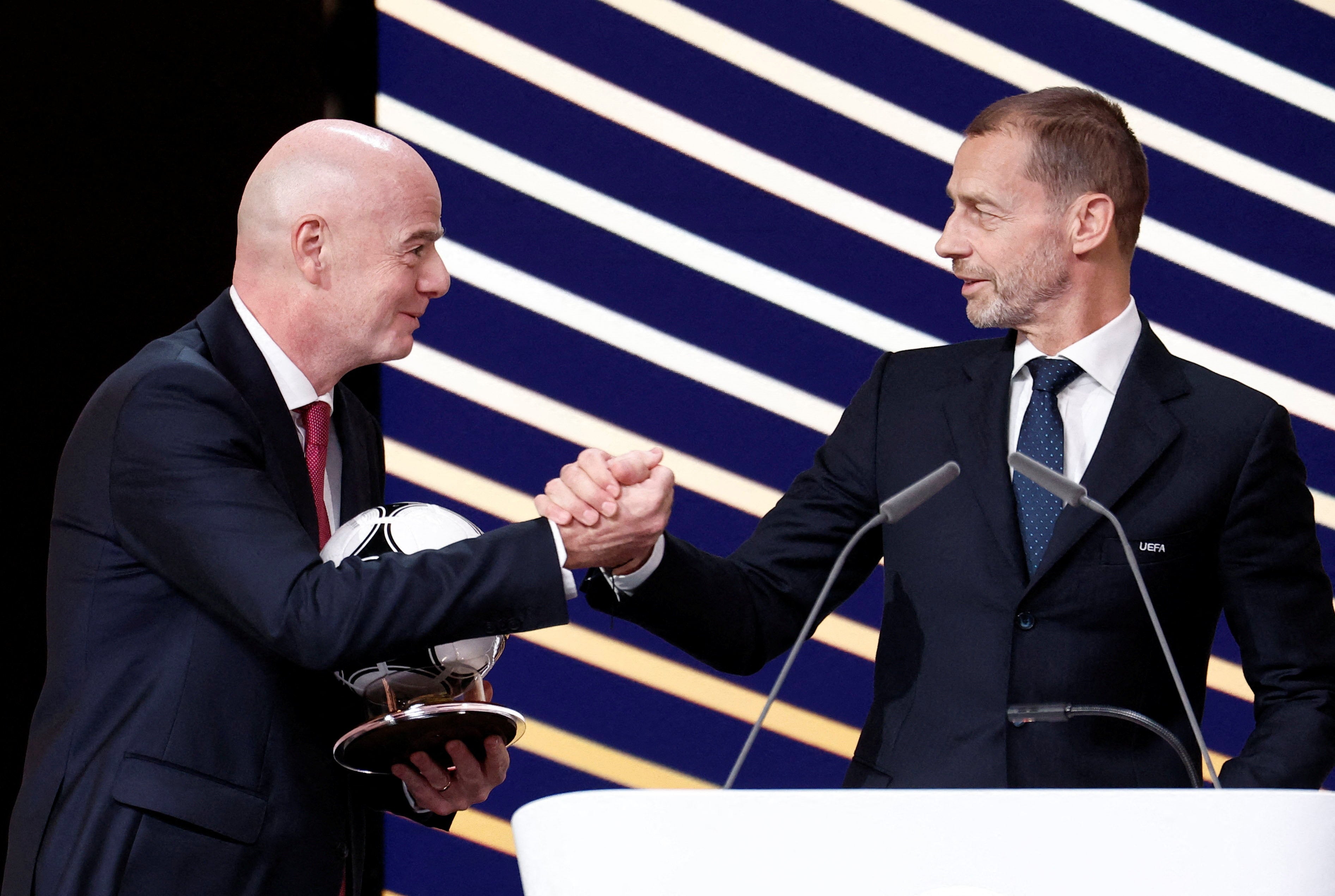 Uefa president Aleksander Ceferin, right, has gone to war with Fifa president Gianni Infantino