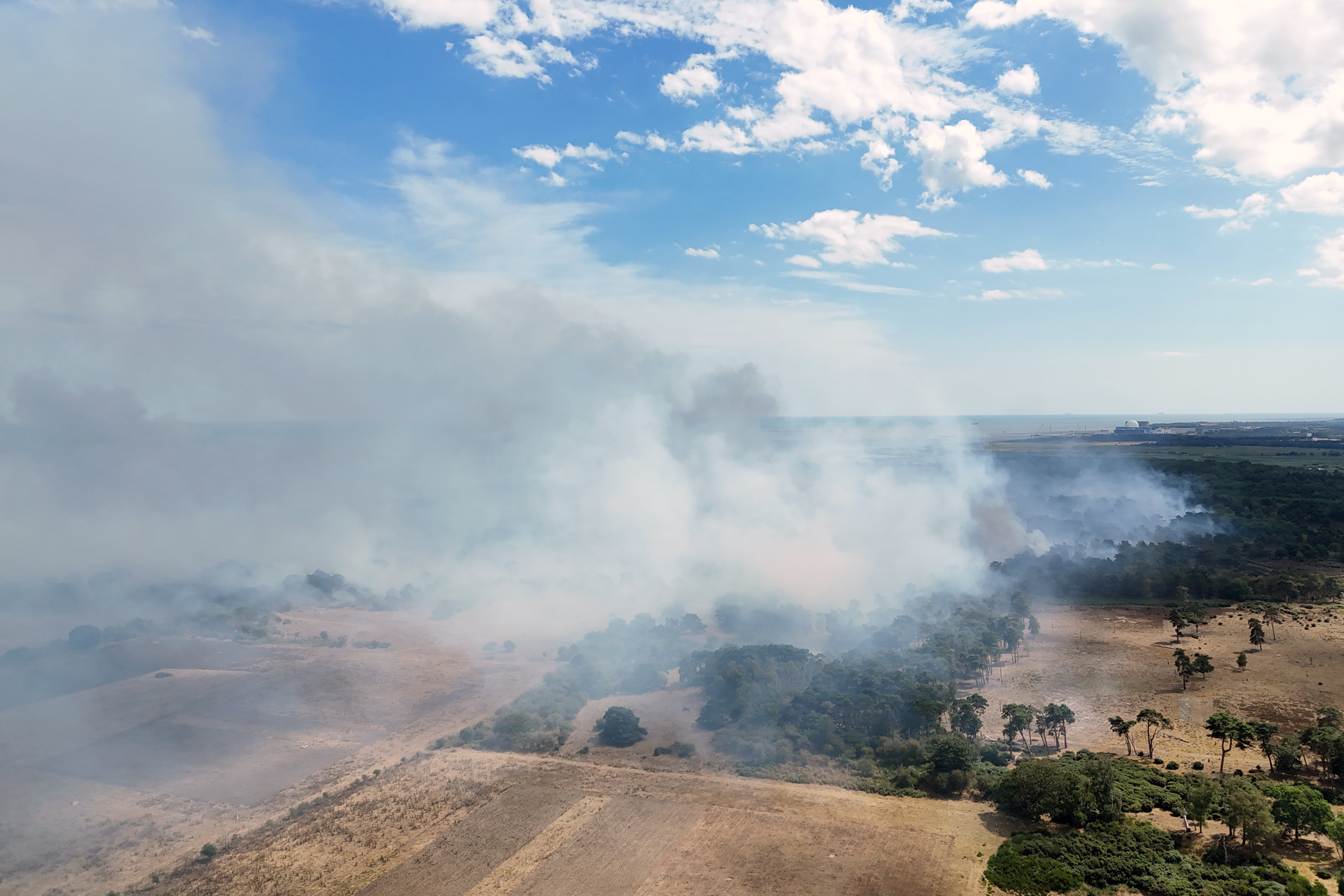 Smoke rises from a wildfire at Dunwich Heath (Joe Giddens/PA) (PA Wire)