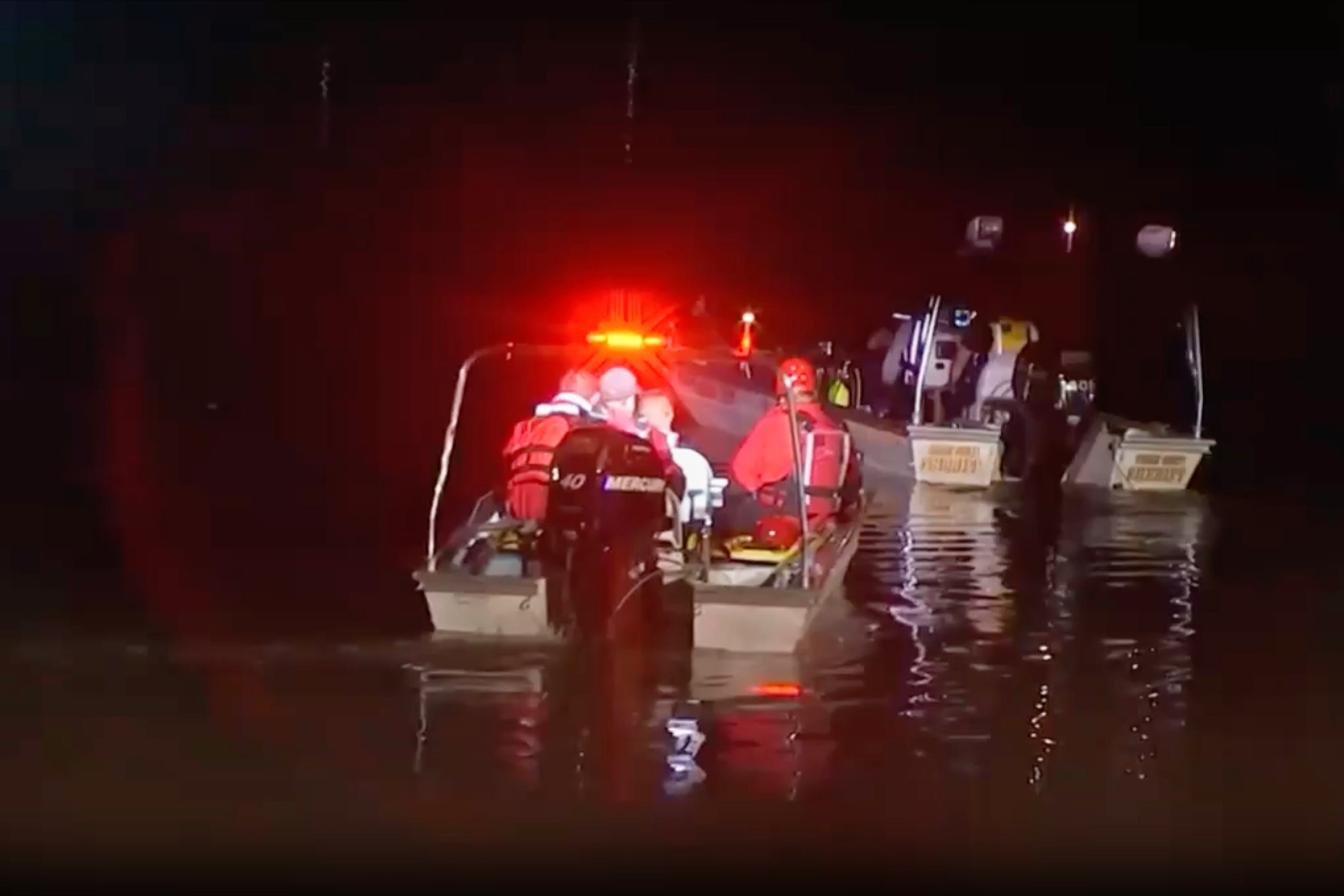 One child has died and another is missing after three children got trapped in a rain-swollen river in New Jersey