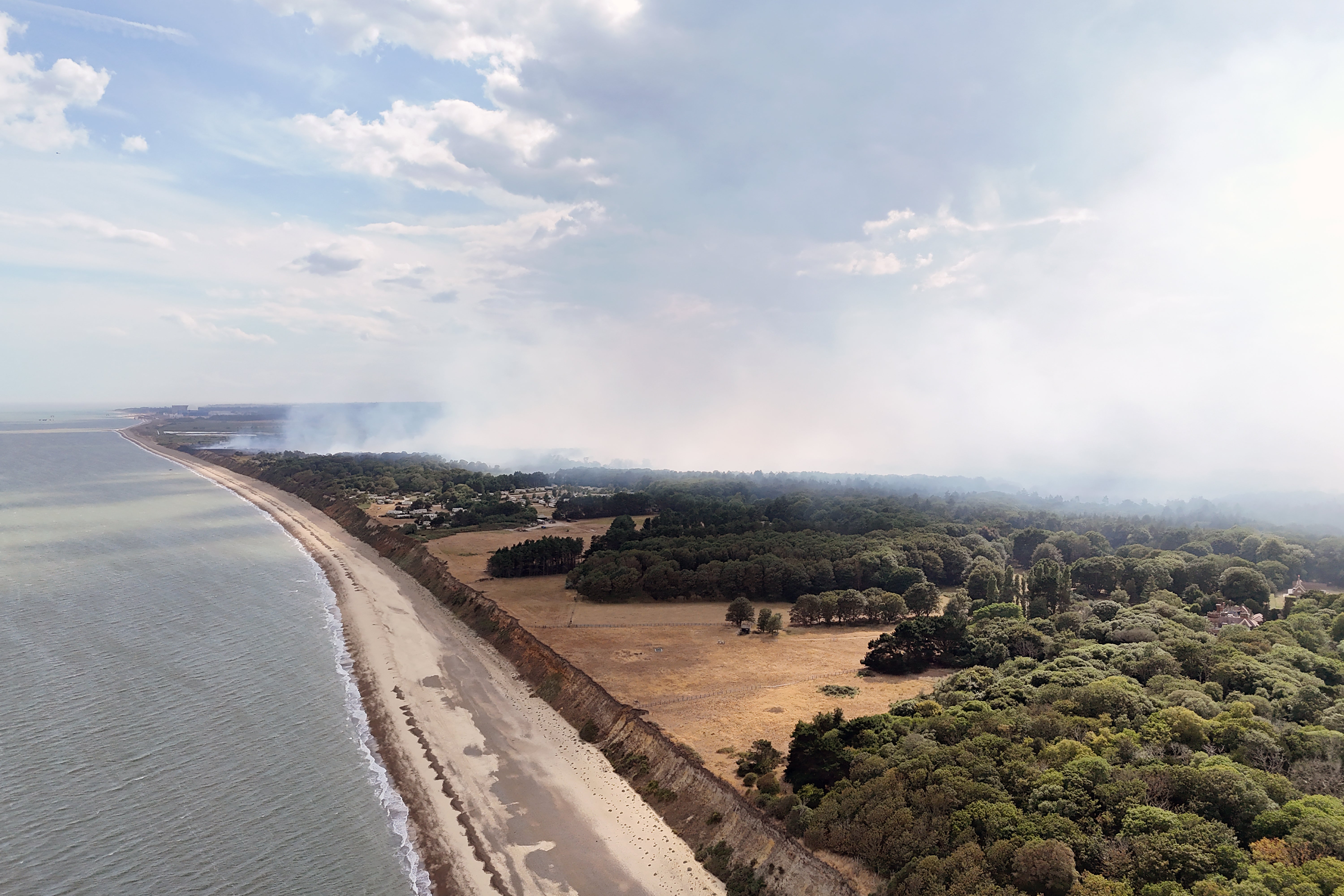 Smoke rises from a wildfire at Dunwich Heath, near Leiston (Joe Giddens/PA) (PA Wire)