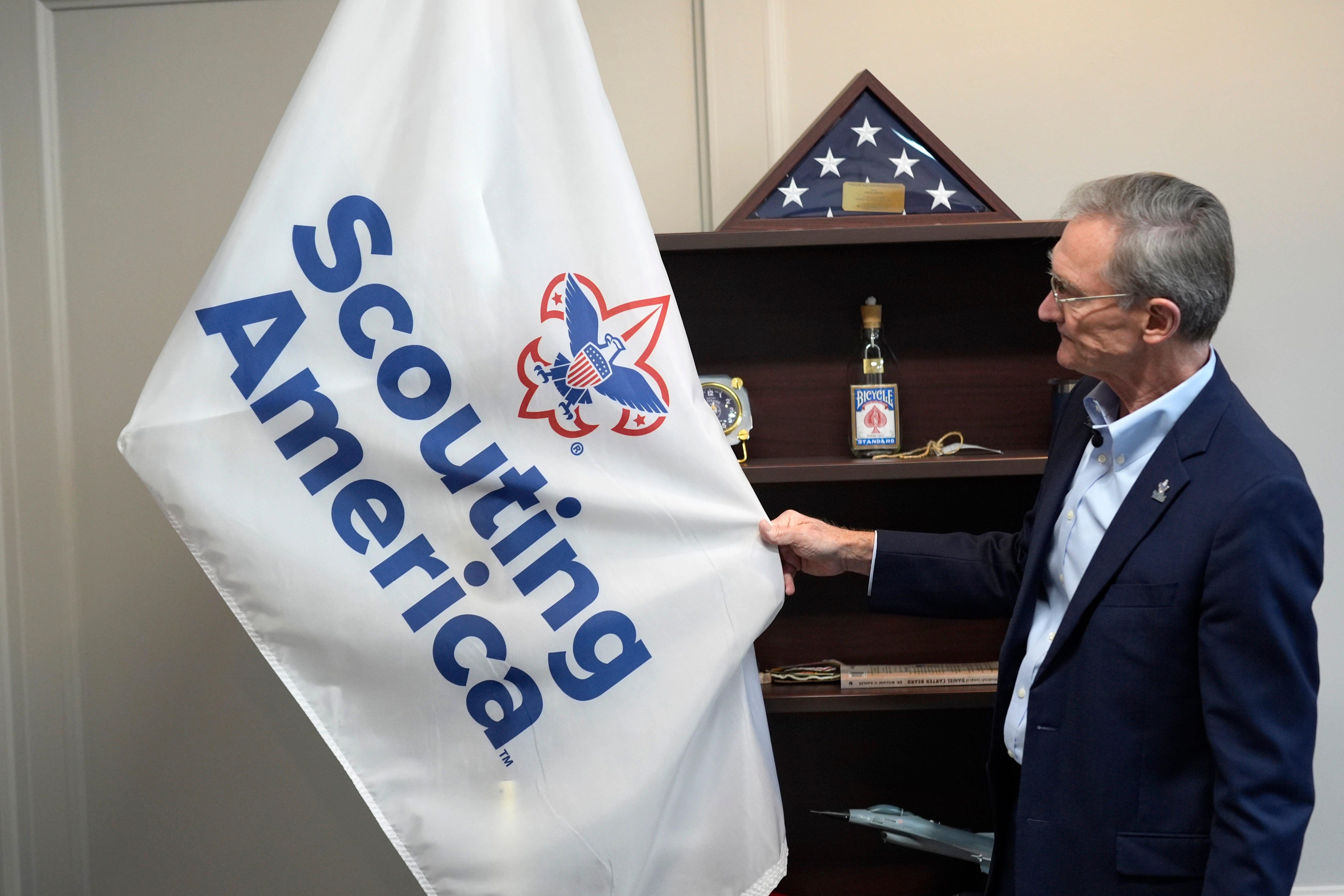 Roger Krone, chief executive officer of Scouting America, describes the design of the organization's flag in Irving, Texas, Feb. 5, 2025
