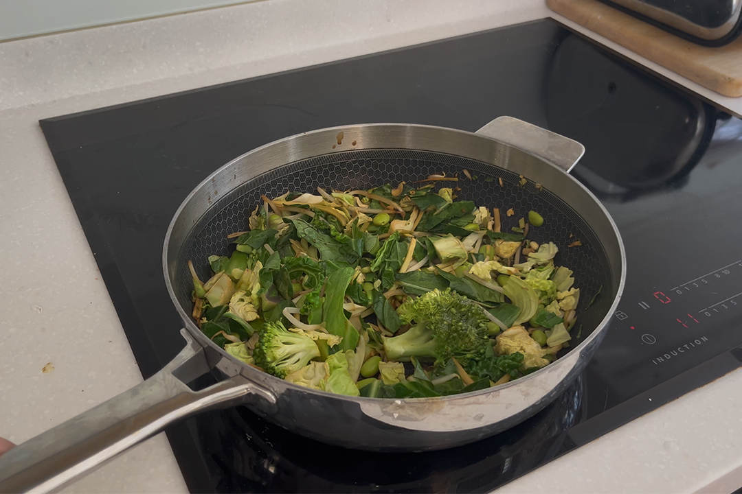 It’s light enough for me to shake a stir fry one-handed (Lois Borny/The Independent)