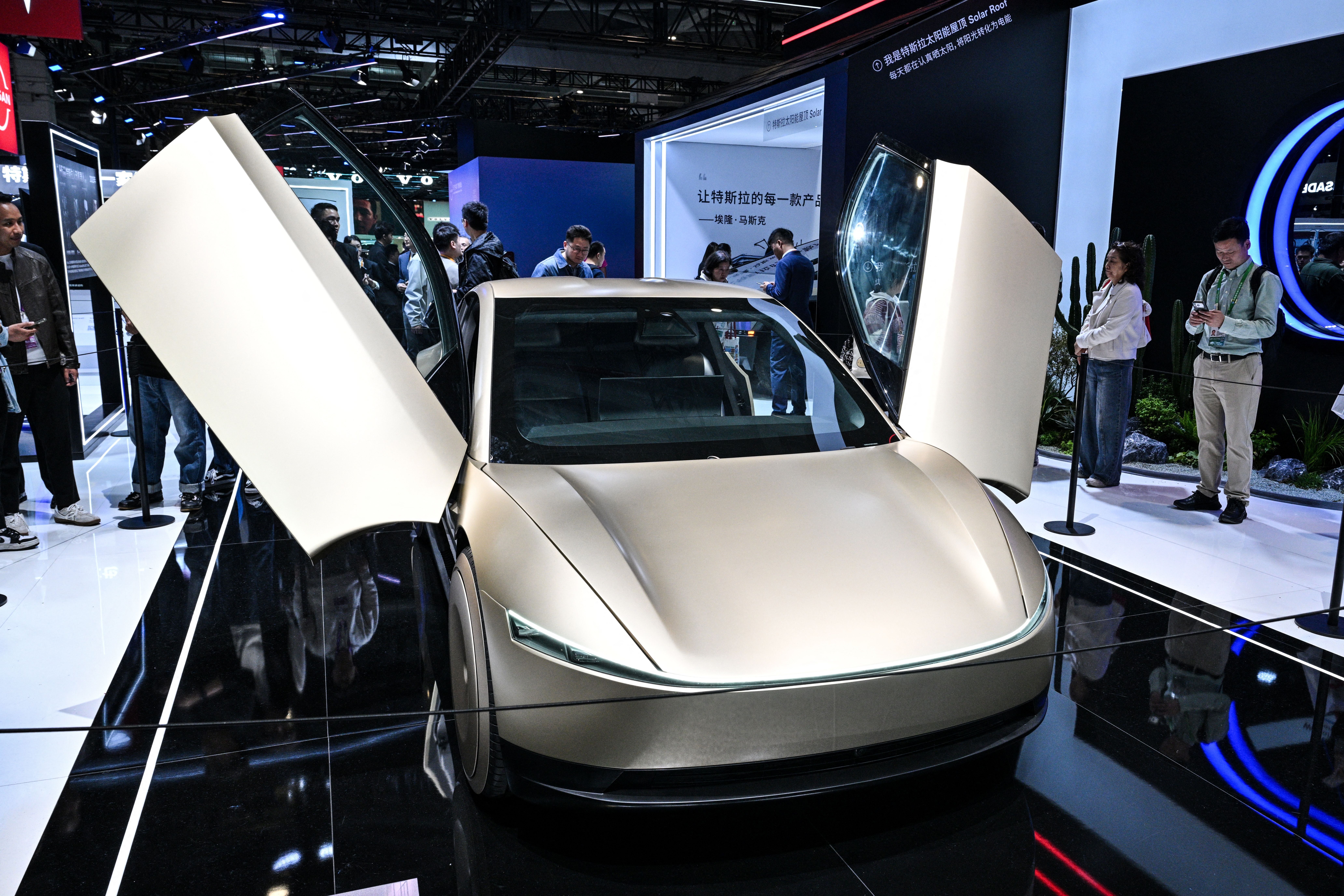 A Tesla Cybercab car is seen at the Tesla stand during the 8th International Import Expo (CIIE) in Shanghai on November 6, 2025 (AFP/Getty)
