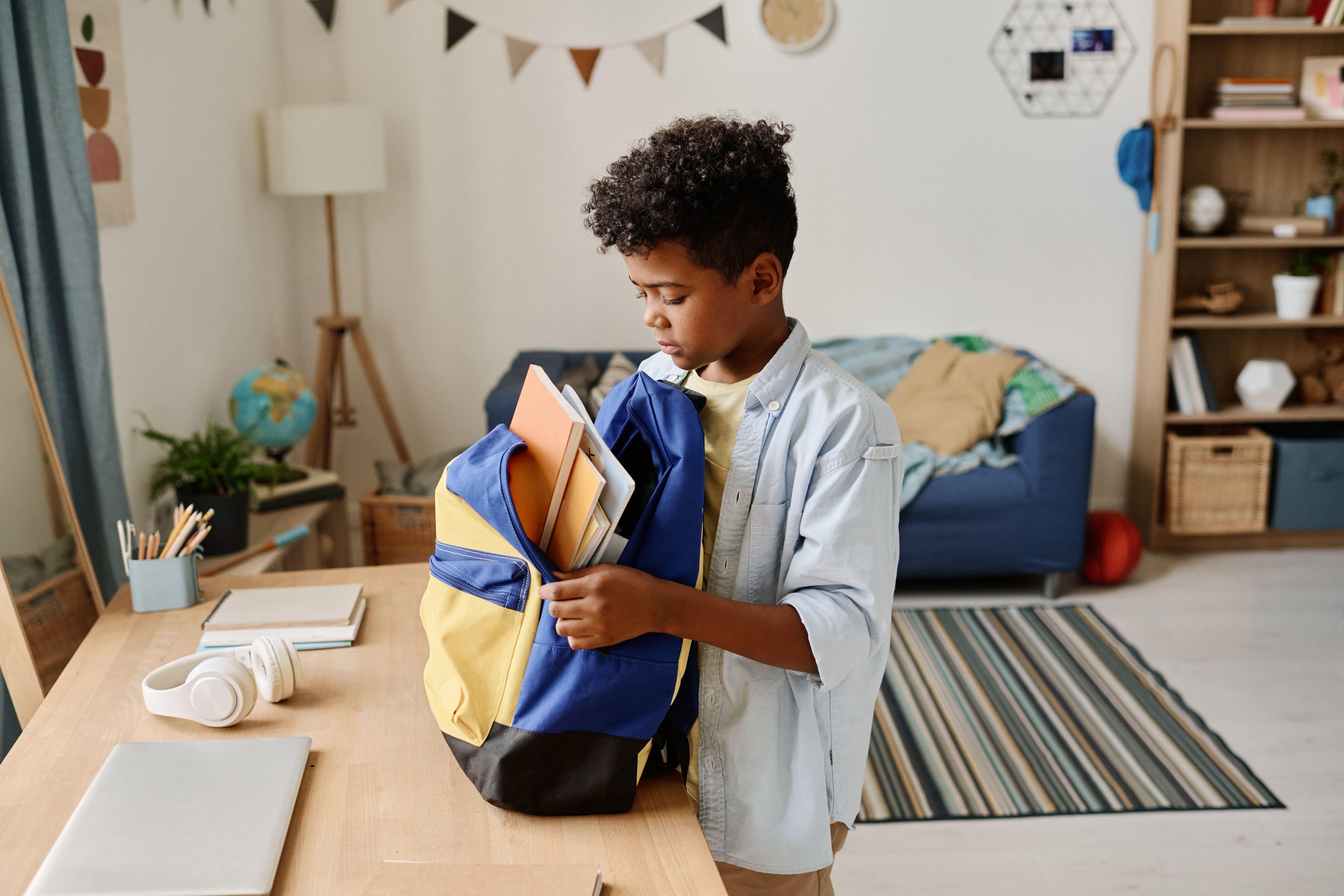 According to the latest research from the Child Poverty Action Group and Loughborough University’s Centre for Research in Social Policy (CRSP), the minimum cost of education is over £1,000 a year for a UK primary-school child (PA)