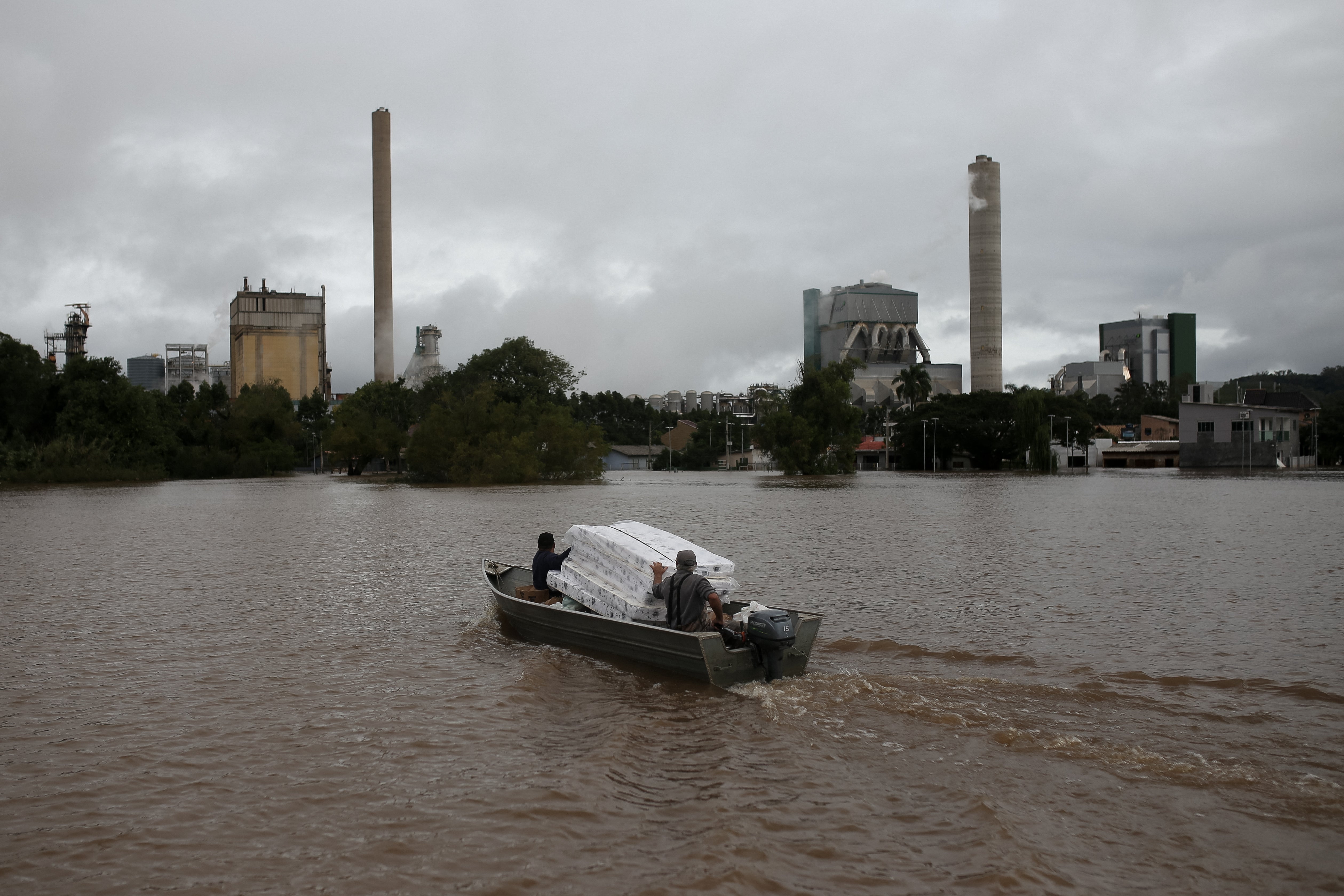 Volunteers transport mattresses to be taken to Guaiba for flood victims in Porto Alegre, Rio Grande do Sul state, Brazil, on May 13, 2024