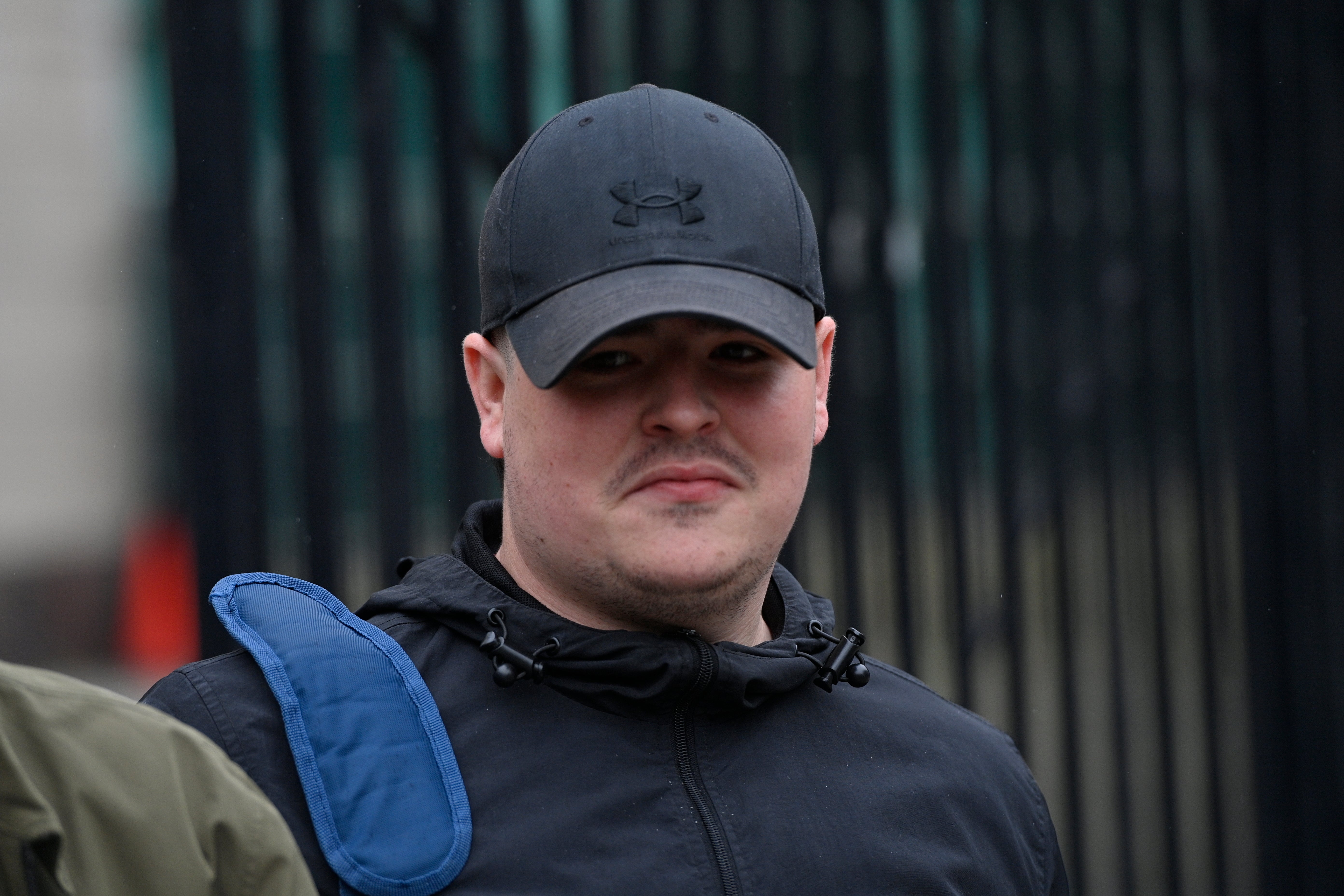 Jordan Gareth Devine outside Belfast Crown Court, after he, Paul McIntyre, and Peter Cavanagh were found not guilty of Lyra McKee's murder (PA)