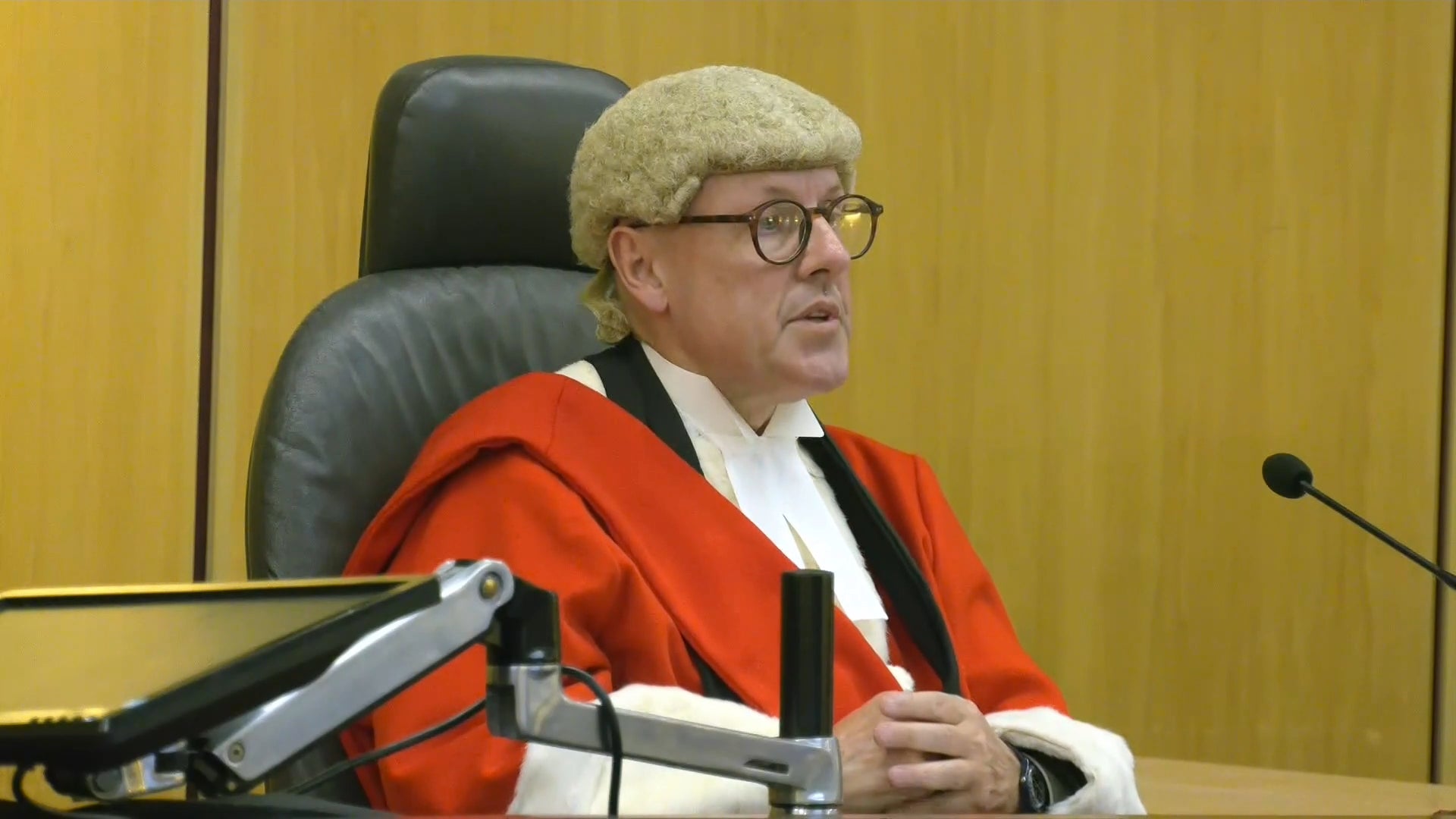 Mr Justice Hilliard sentencing funeral director Robert Bush, 48, to twenty years in prison for 67 offences, including 30 counts of preventing a lawful burial, at Hull Crown Court, Kingston-upon-Hull. Picture date: Friday July 31, 2026. (PA)