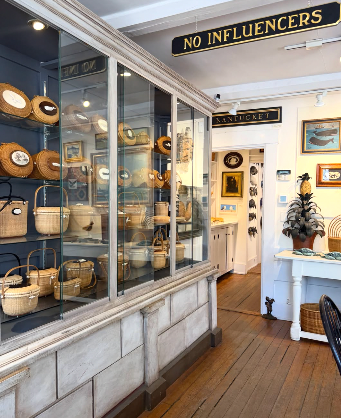 Four Winds Craft Guild, which specializes in luxury handwoven baskets and artisan accessories, displays a divisive ‘No Influencers’ sign in its store (Instagram / Four Winds Crafts Guild)