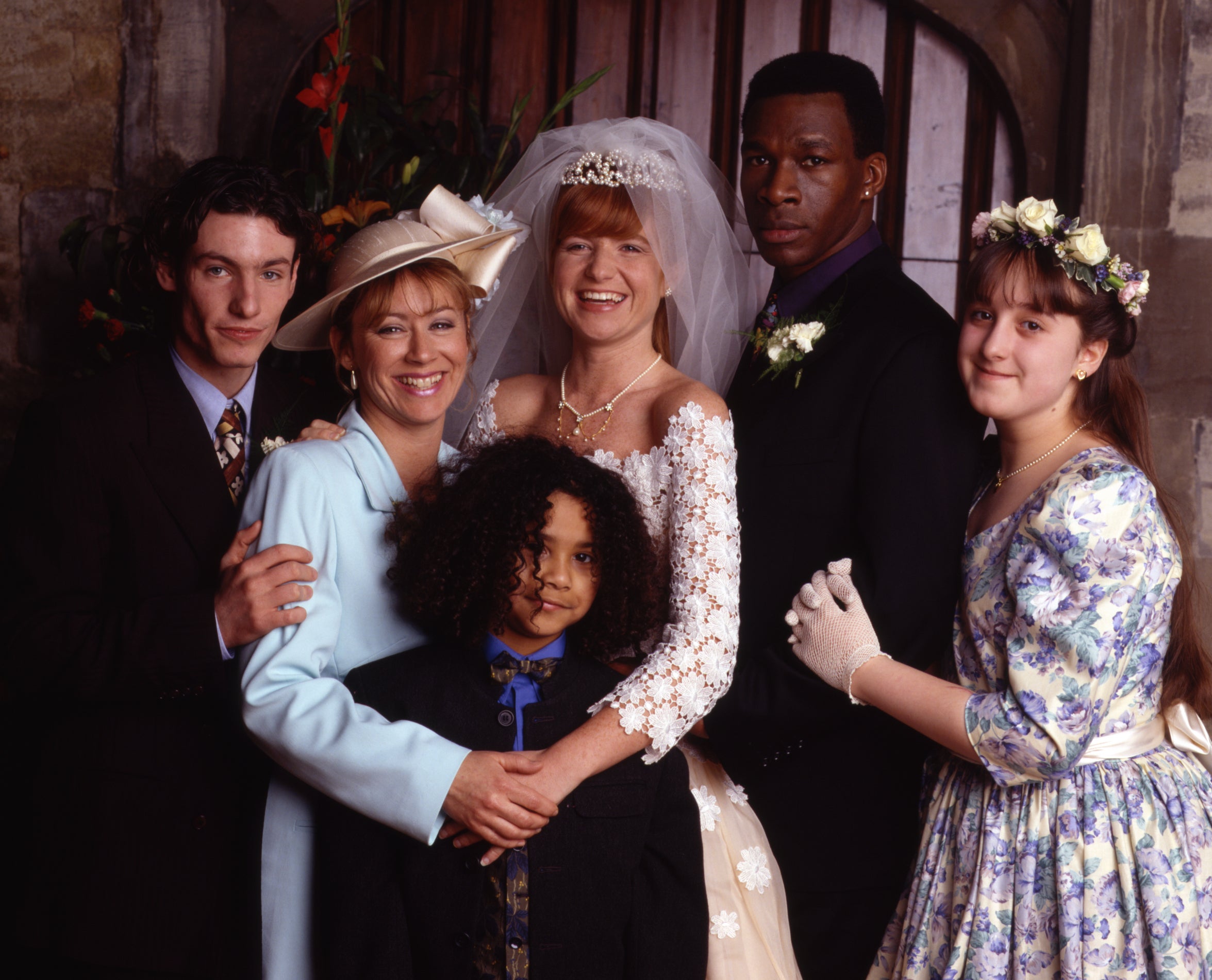Cassidy, alongside her ‘EastEnders’ family Dean Gaffney, Lindsey Coulson, Devon Anderson, Patsy Palmer and Howard Antony, in 1997