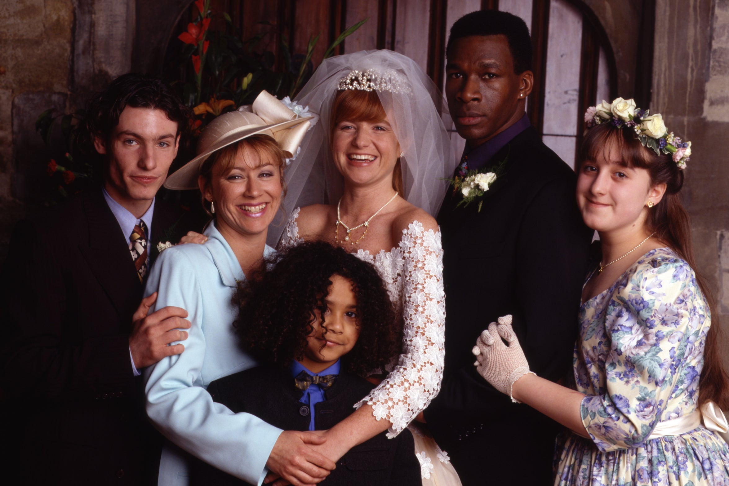 Cassidy, alongside her ‘EastEnders’ family Dean Gaffney, Lindsey Coulson, Devon Anderson, Patsy Palmer and Howard Antony, in 1997 (BBC)
