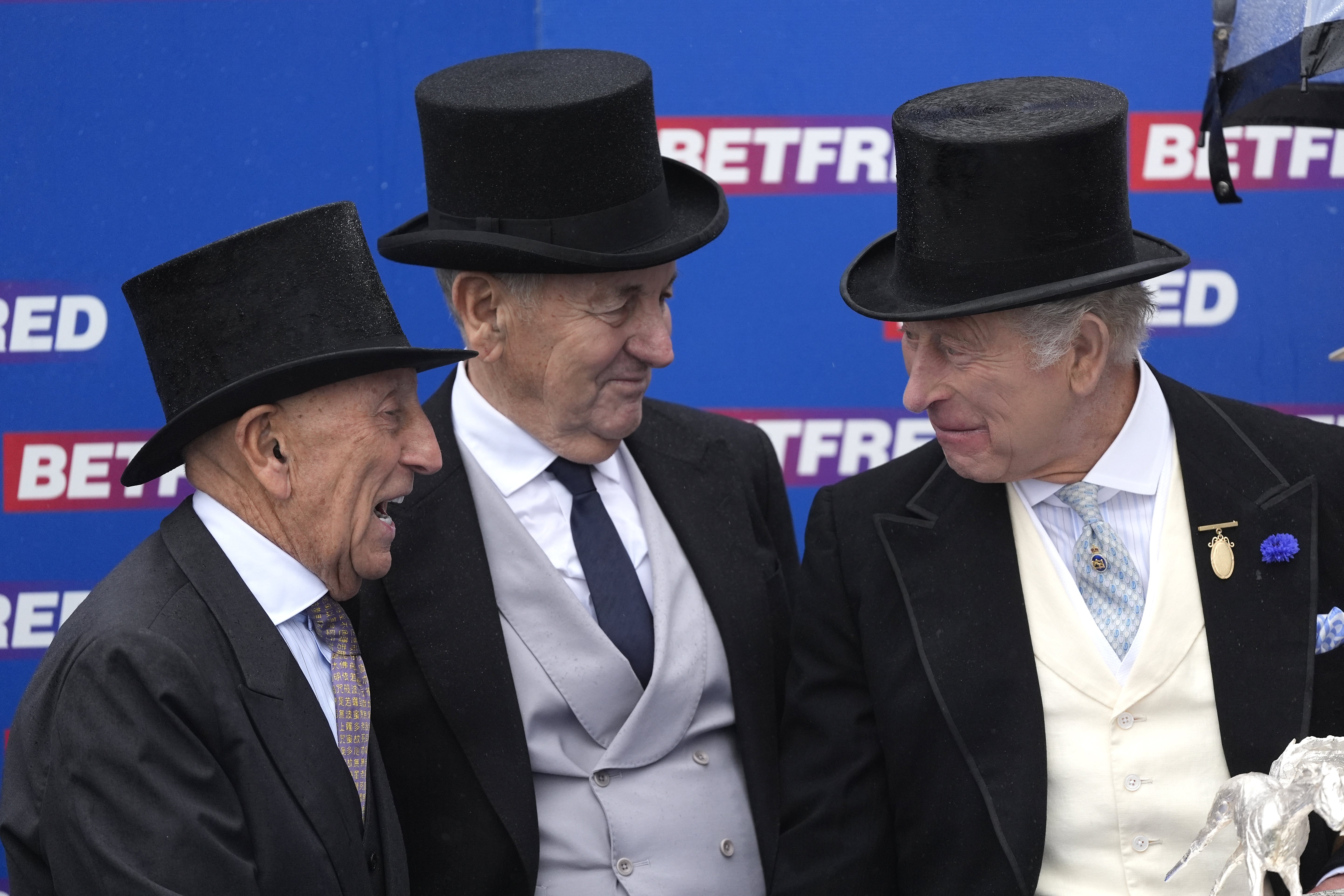 Betfred owners Fred Done (left) and Peter Done with Charles (right) after the Betfred Derby (Andrew Matthews/PA)