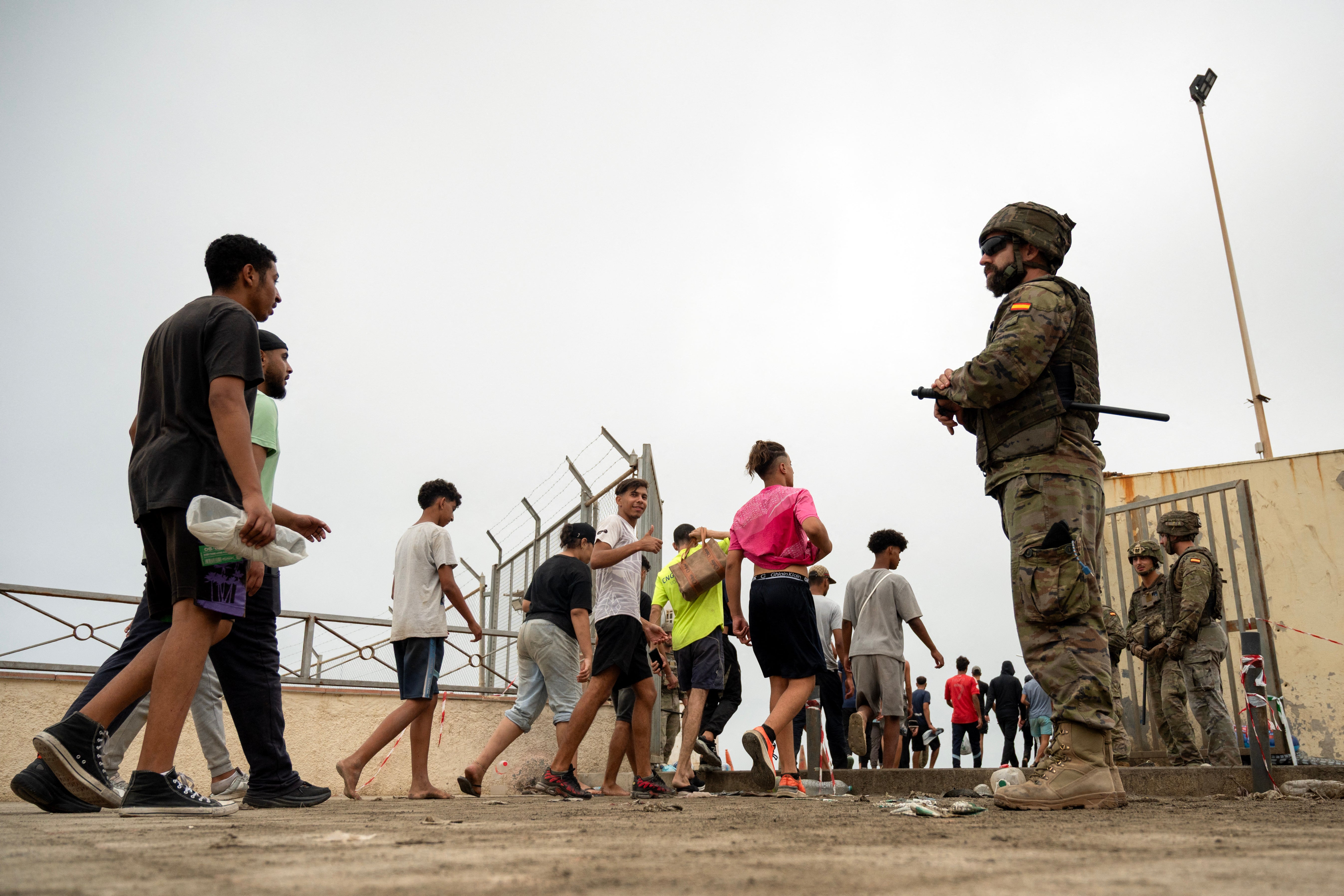 Migrants cross back to Morocco after they crossed the border to enter Spain's north Africa's Ceuta enclave on July 31, 2026. (Photo by JORGE GUERRERO / AFP via Getty Images) (AFP/Getty)