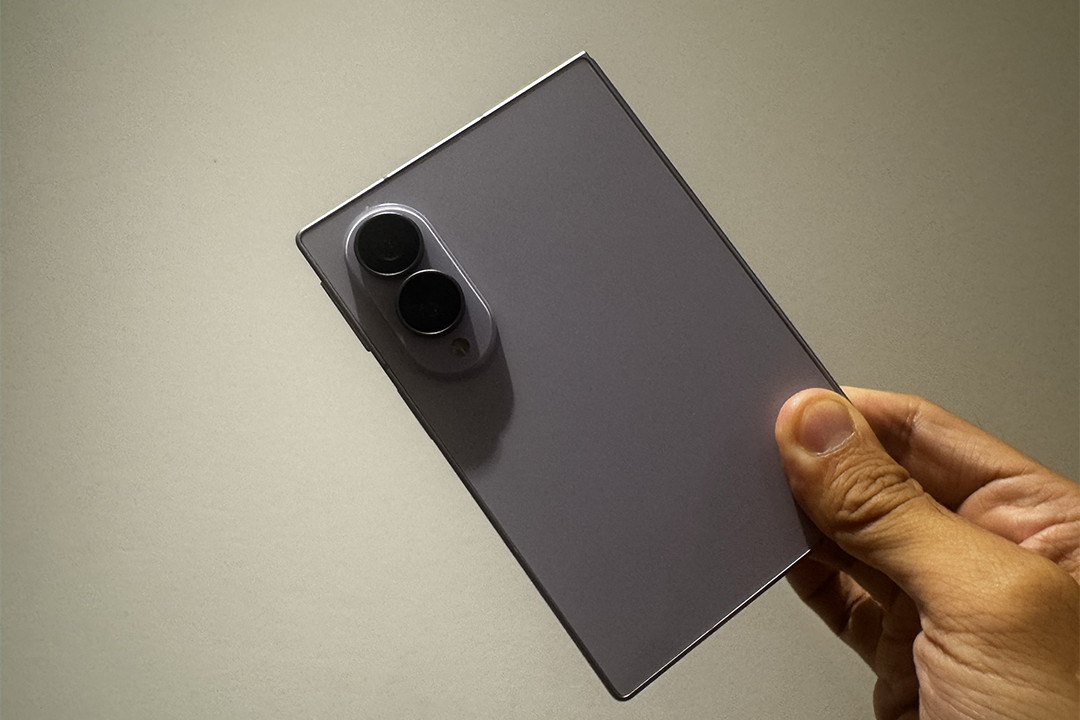 It boasts a compact, passport-style design