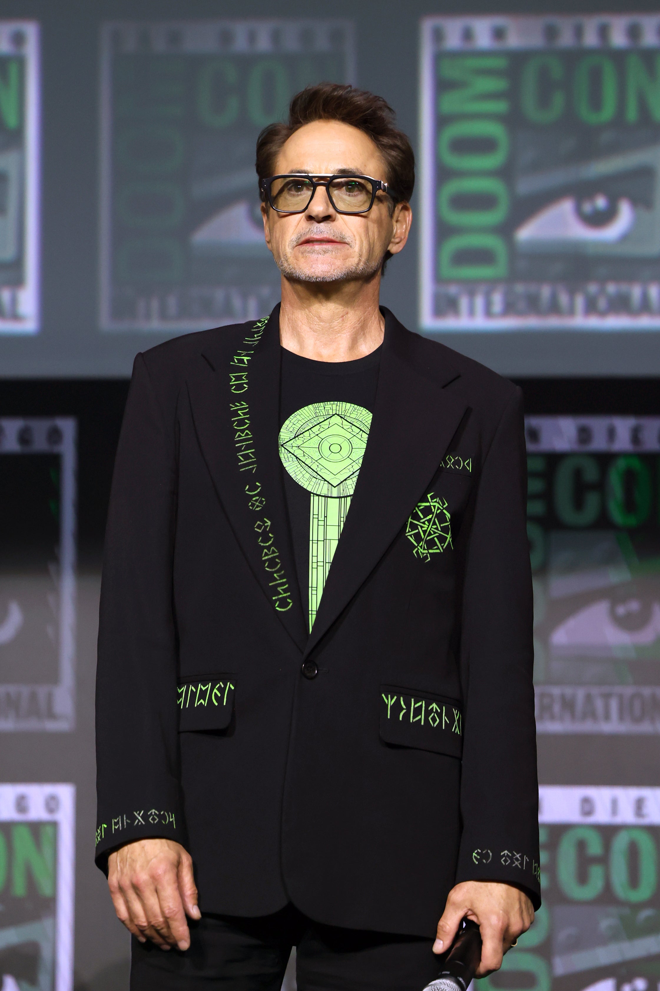 Robert Downey Jr. wearing a jacket covered in runes at an 'Avengers: Doomsday' event at San Diego Comic-Con in July 2026 (Getty)
