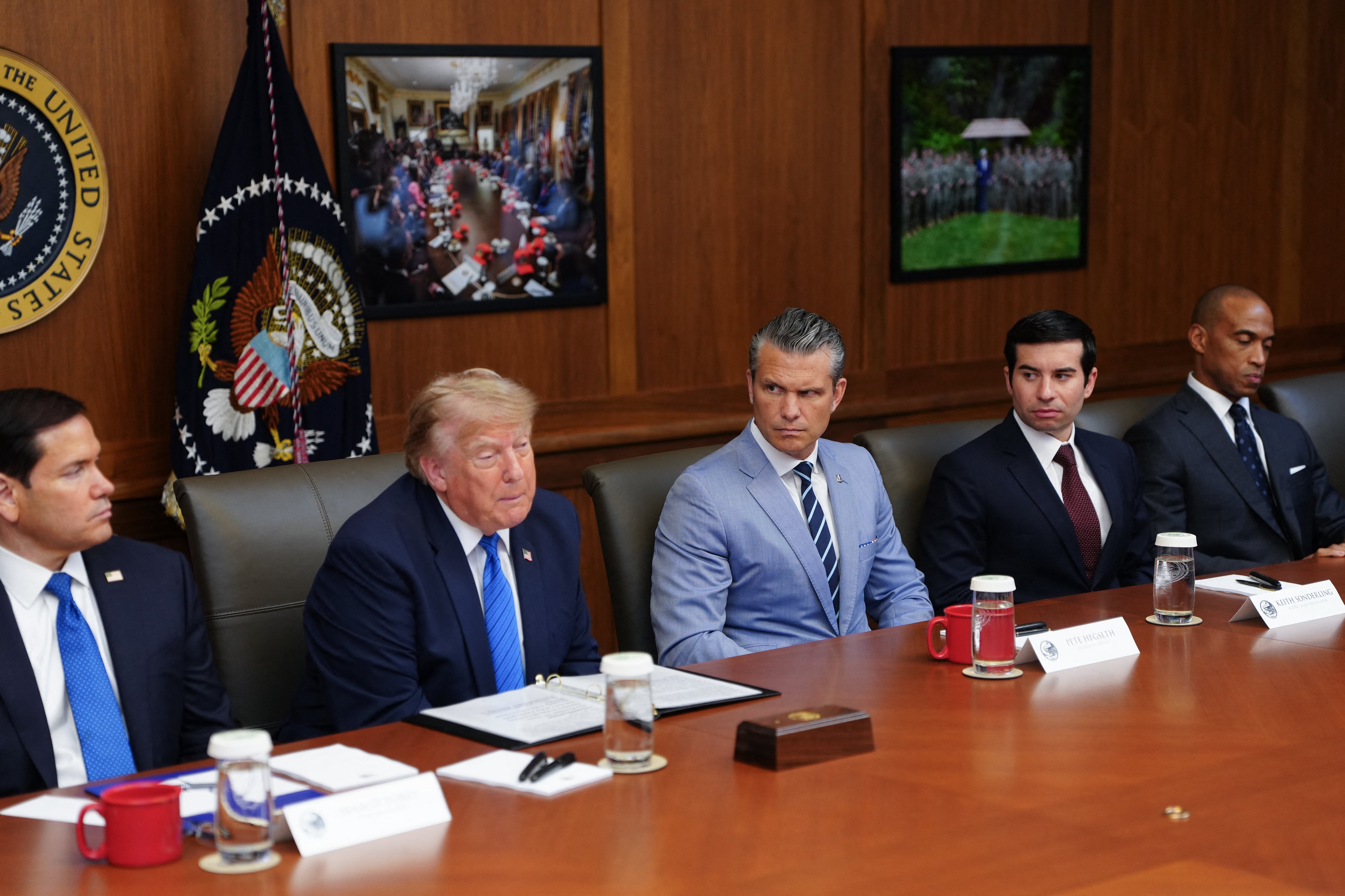 The president has been accused of presiding over a team of ‘head-nodders’ and ‘yes people,’ who are expected to respond to his whims and ‘steer where he’s gonna go’ (AFP/Getty)