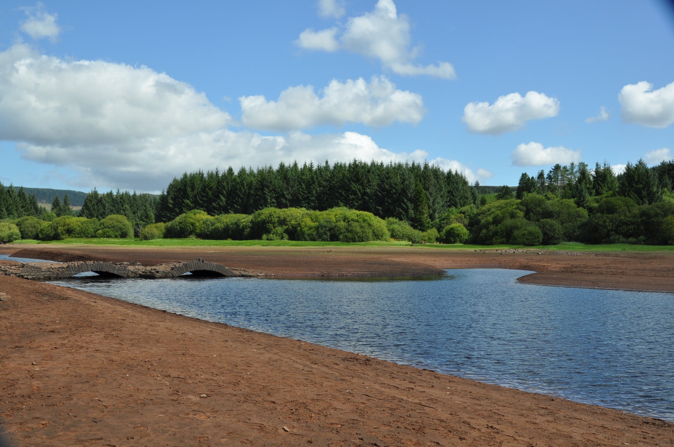 Low water levels at the Llwyn-On reservoir in South Wales revealed an old stone bridge (Eleanor Storey/PA) (PA Wire)