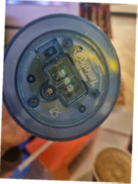 The souvenirs contain button cell batteries that children can easily access, posing a risk if swallowed