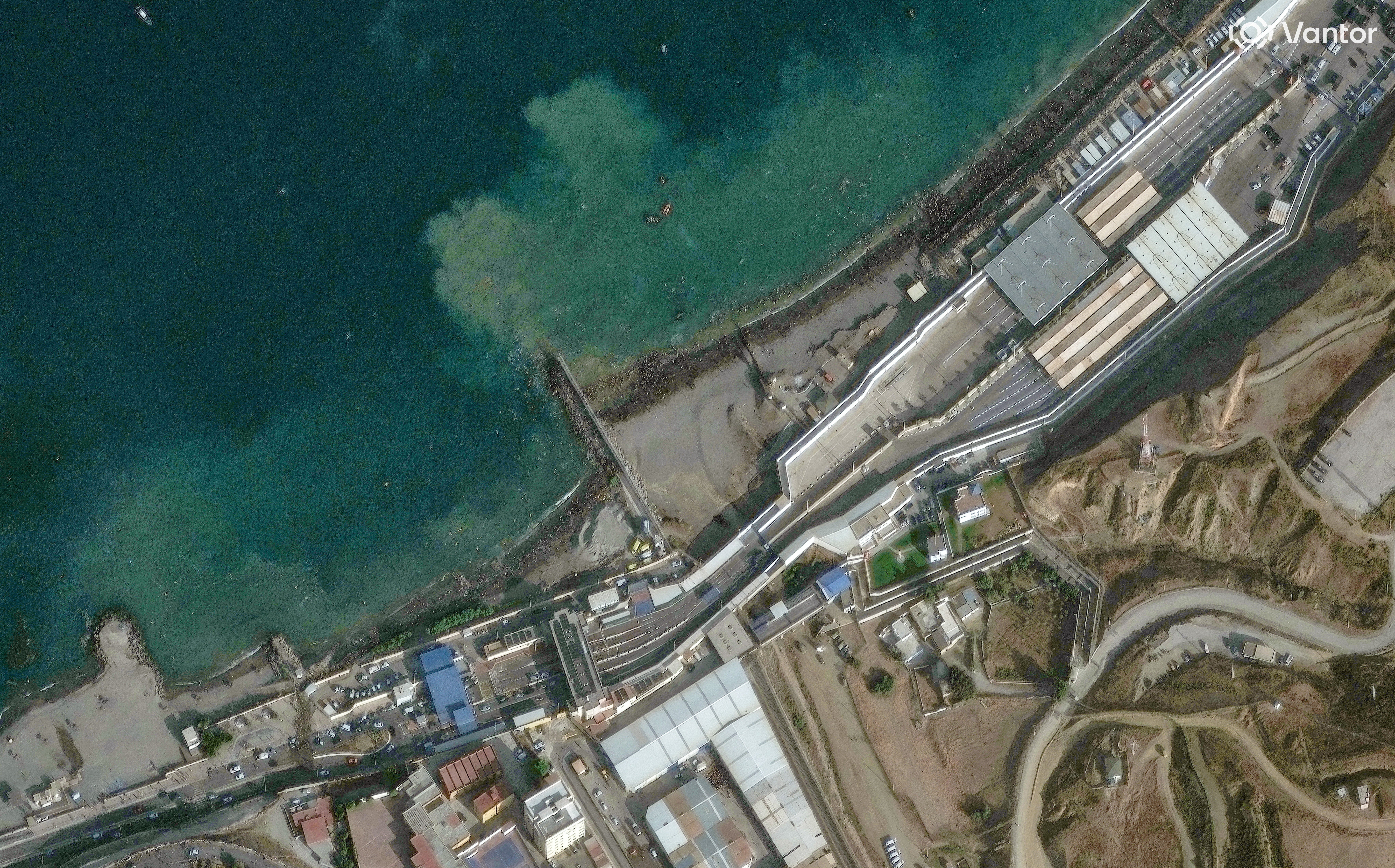 A satellite image shows an overview of crowds overrunning Spain's Ceuta border with Morocco, in Ceuta, Spain