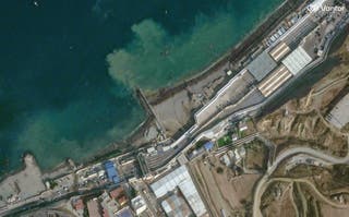 A satellite image shows an overview of crowds overrunning Spain's Ceuta border with Morocco, in Ceuta, Spain