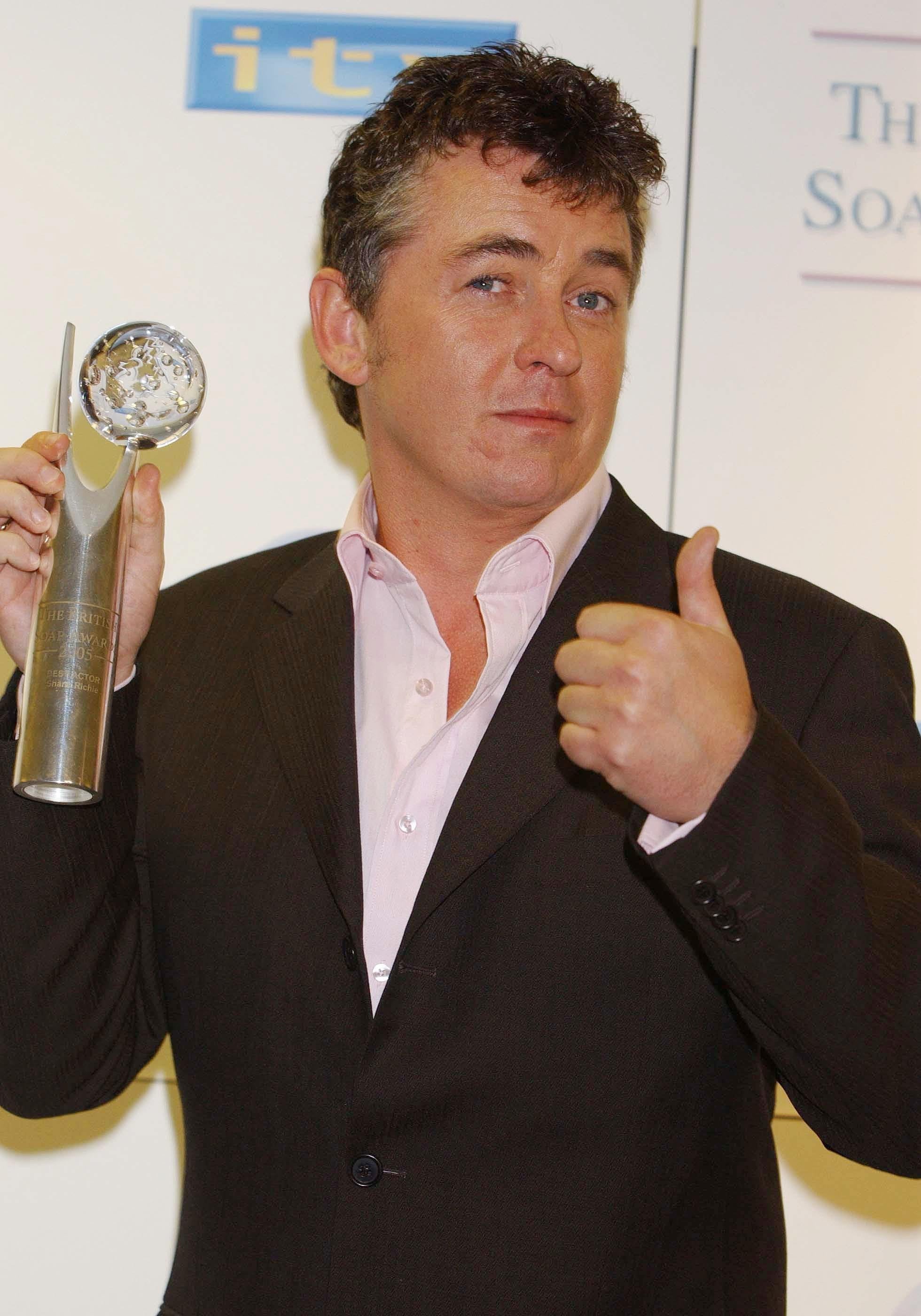 Shane Richie with his Best Actor award for his role as Alfie Moon (PA) (PA Archive)
