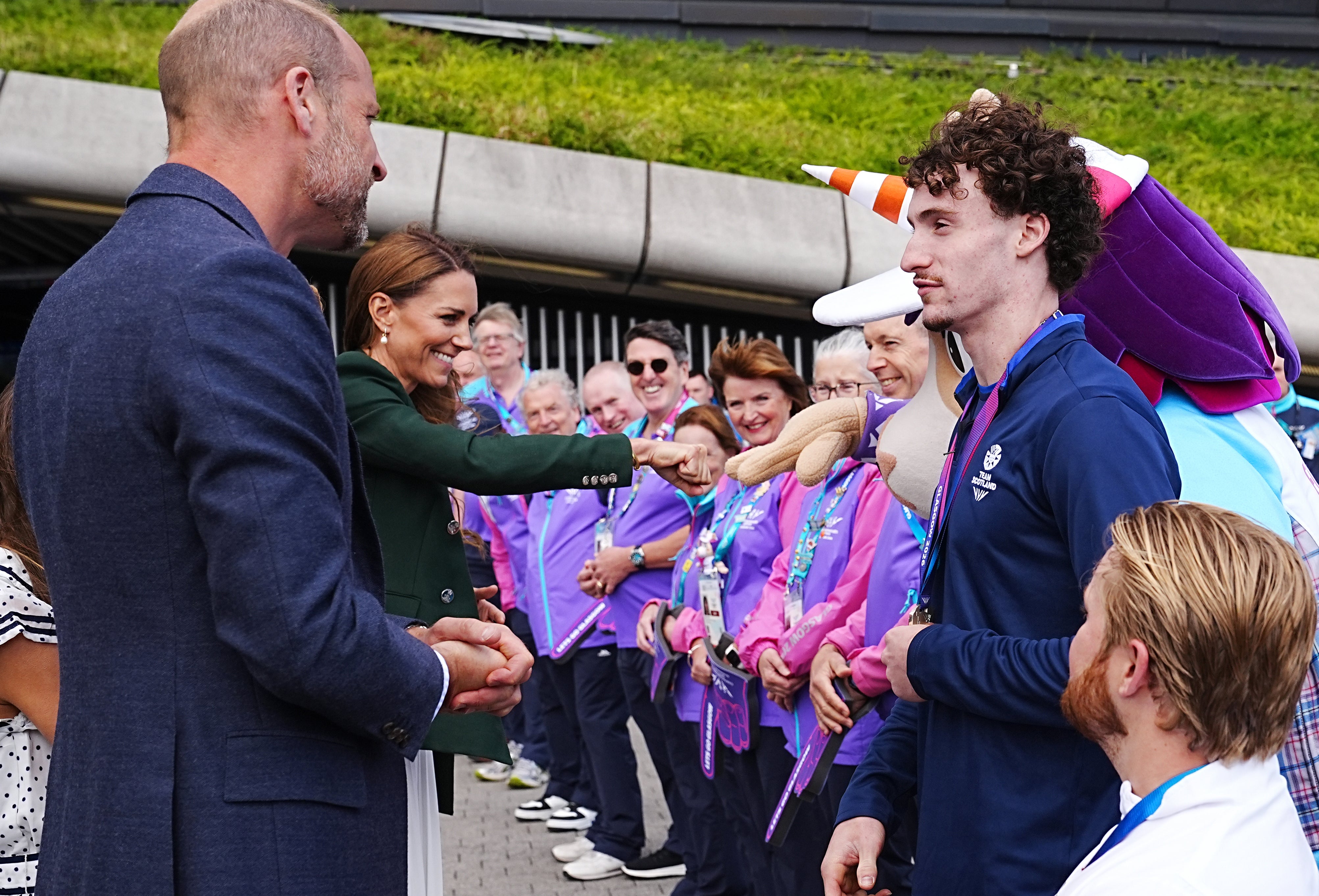 Kate fist-bumps Commonwealth Games mascot Finnie (Jane Barlow/PA)