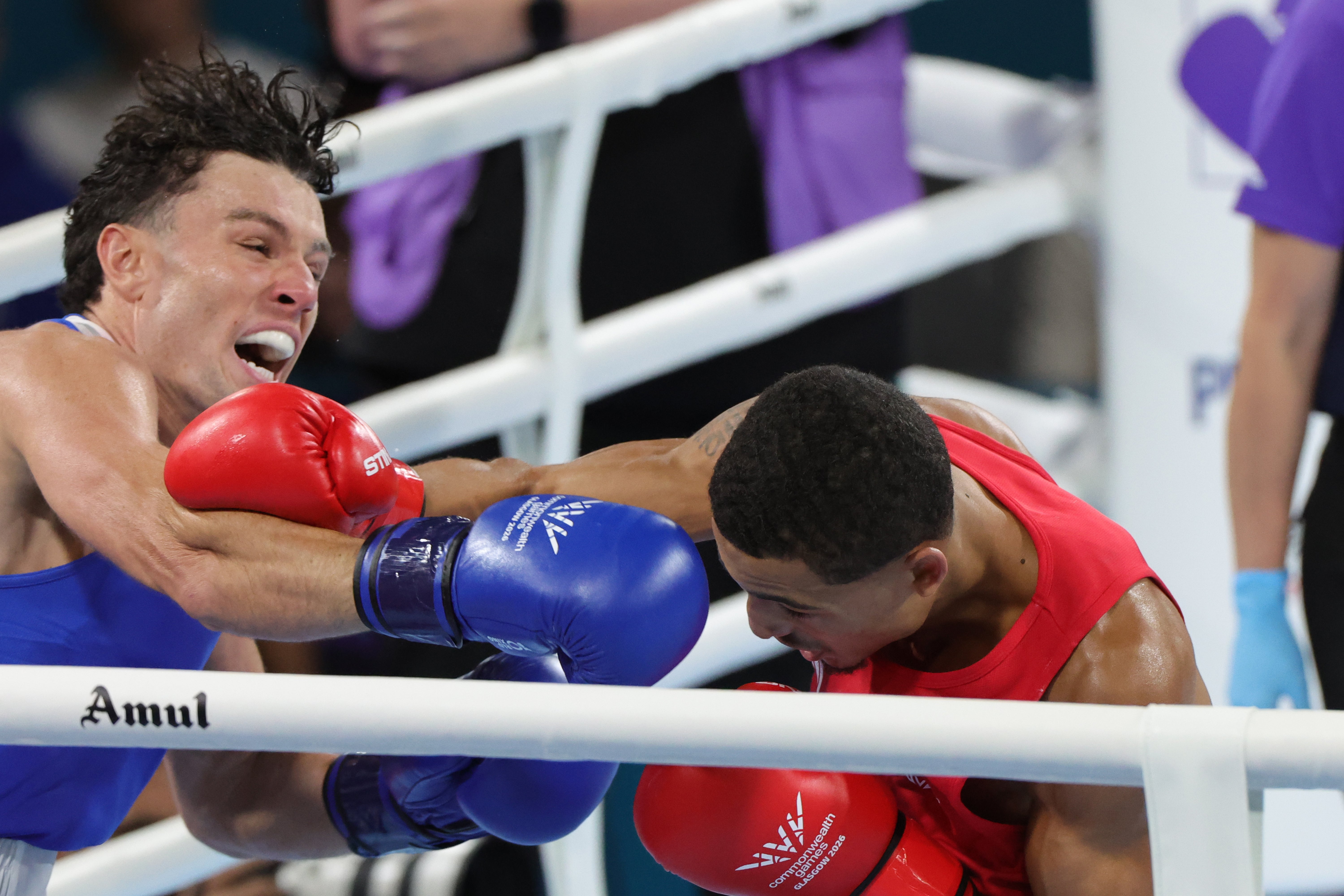 Jon McConnell of Northern Ireland (left) en route to a Commonwealth Games gold medal against Orlando Holley-Sotomi of Wales (Steve Welsh/PA).
