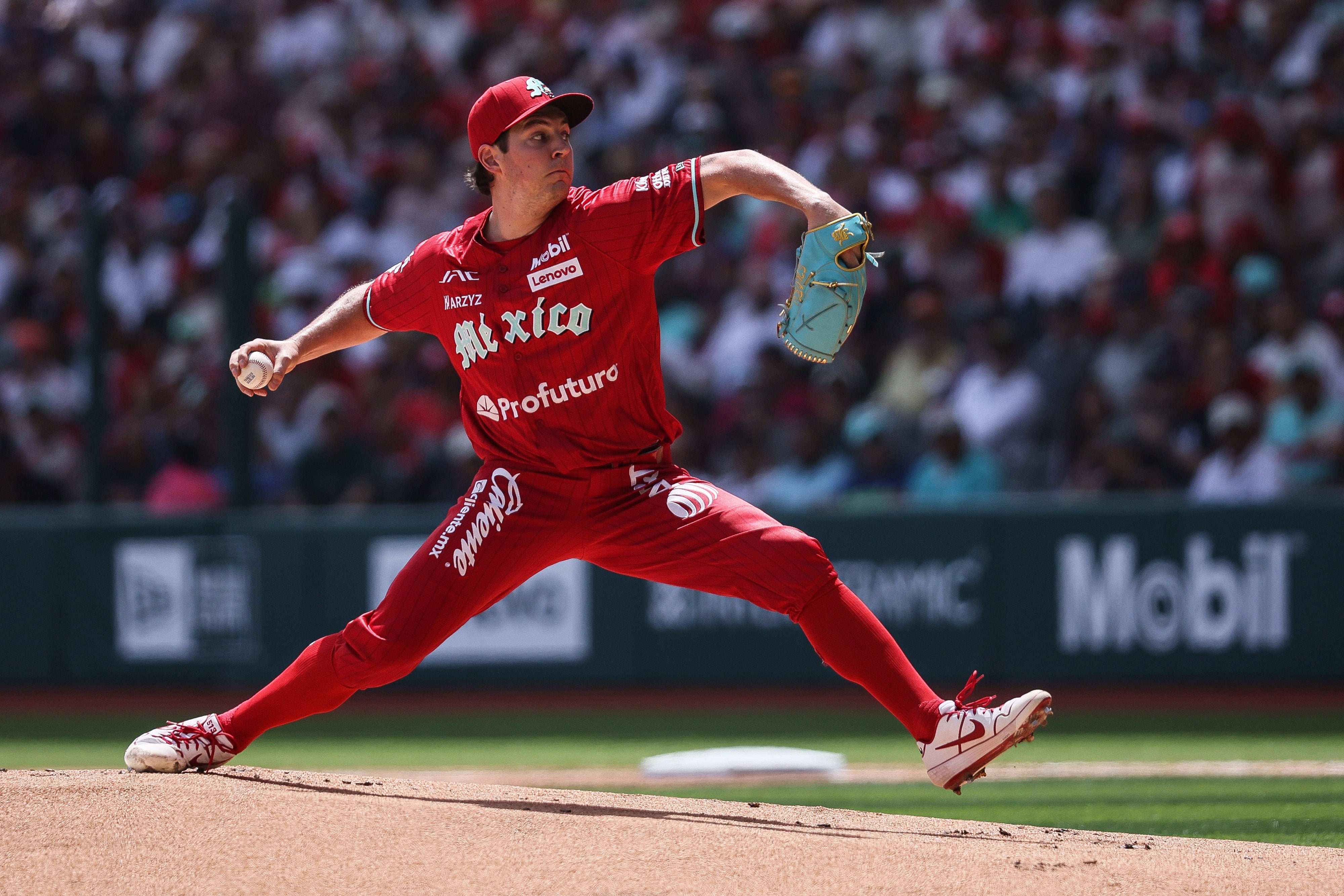 Trevor Bauer pitching for Diablos Rojos during Spring Training Game between Diablos Rojos and New York Yankees