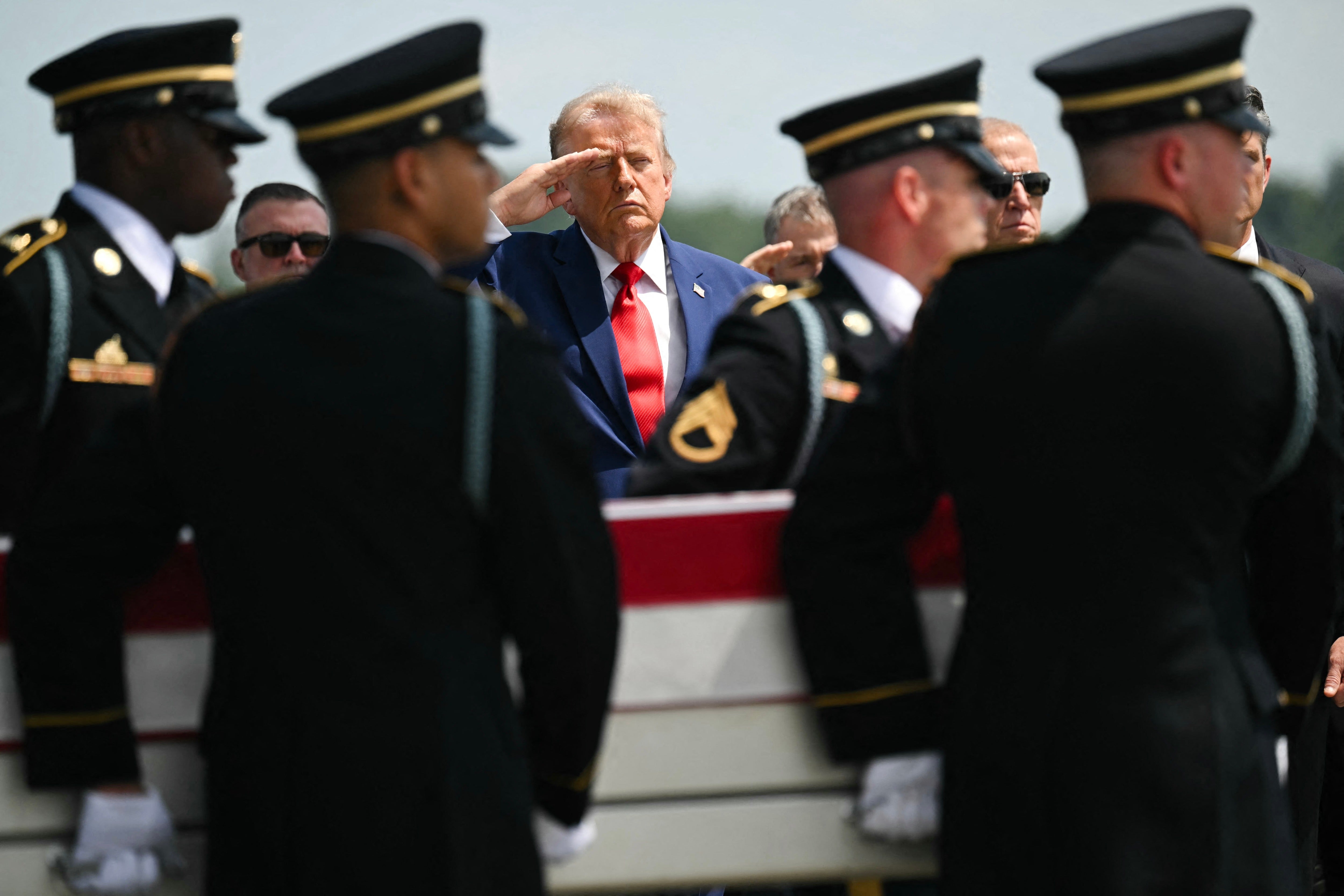 To date, 18 U.S. service members have been killed and hundreds have been wounded, the Pentagon has said. Pictured: Trump salutes at a dignified transfer of the remains of deceased service members on July 22
