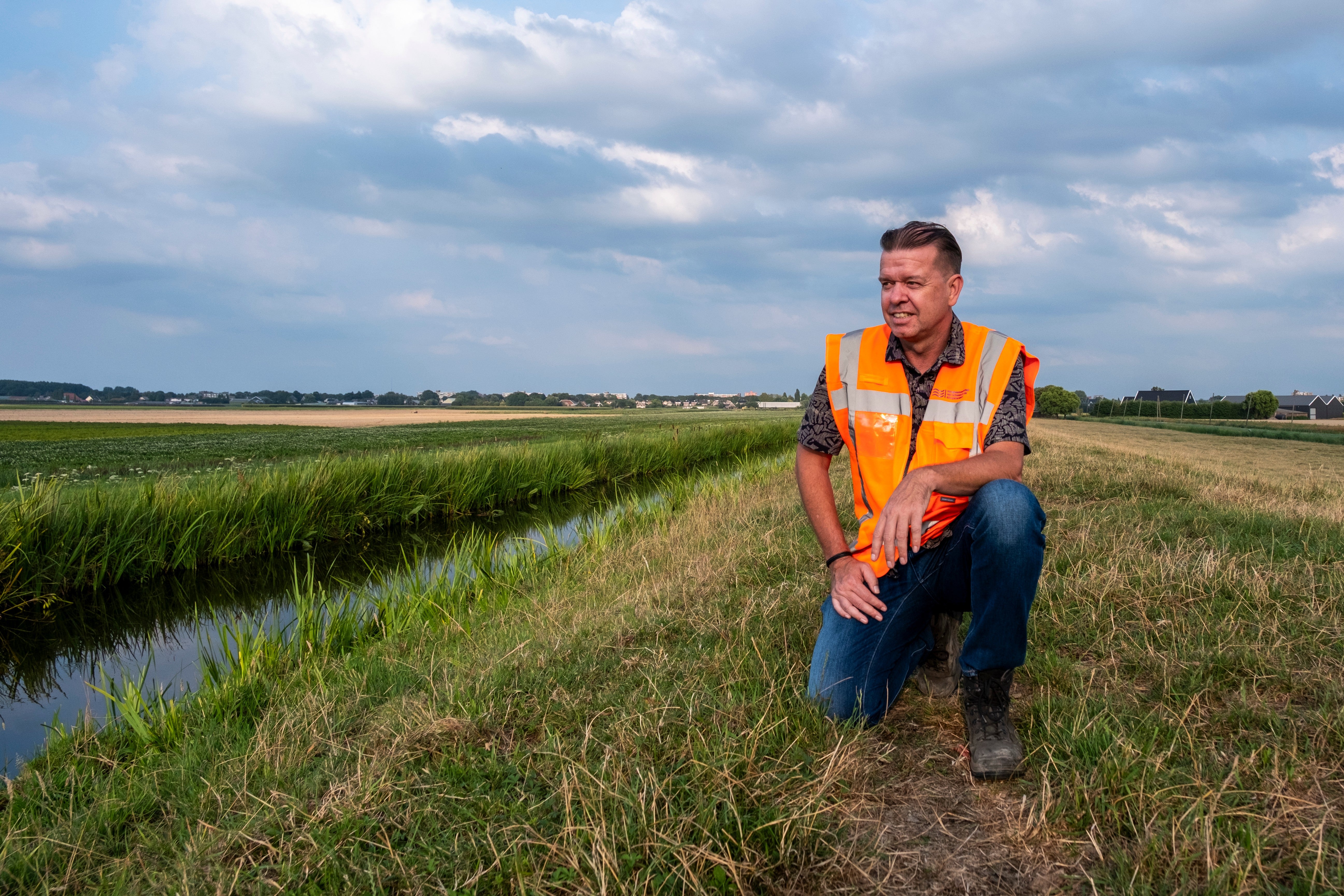 Peter van Duijvendijk, flood defence manager, near a dike in Waddinxveen, Netherlands