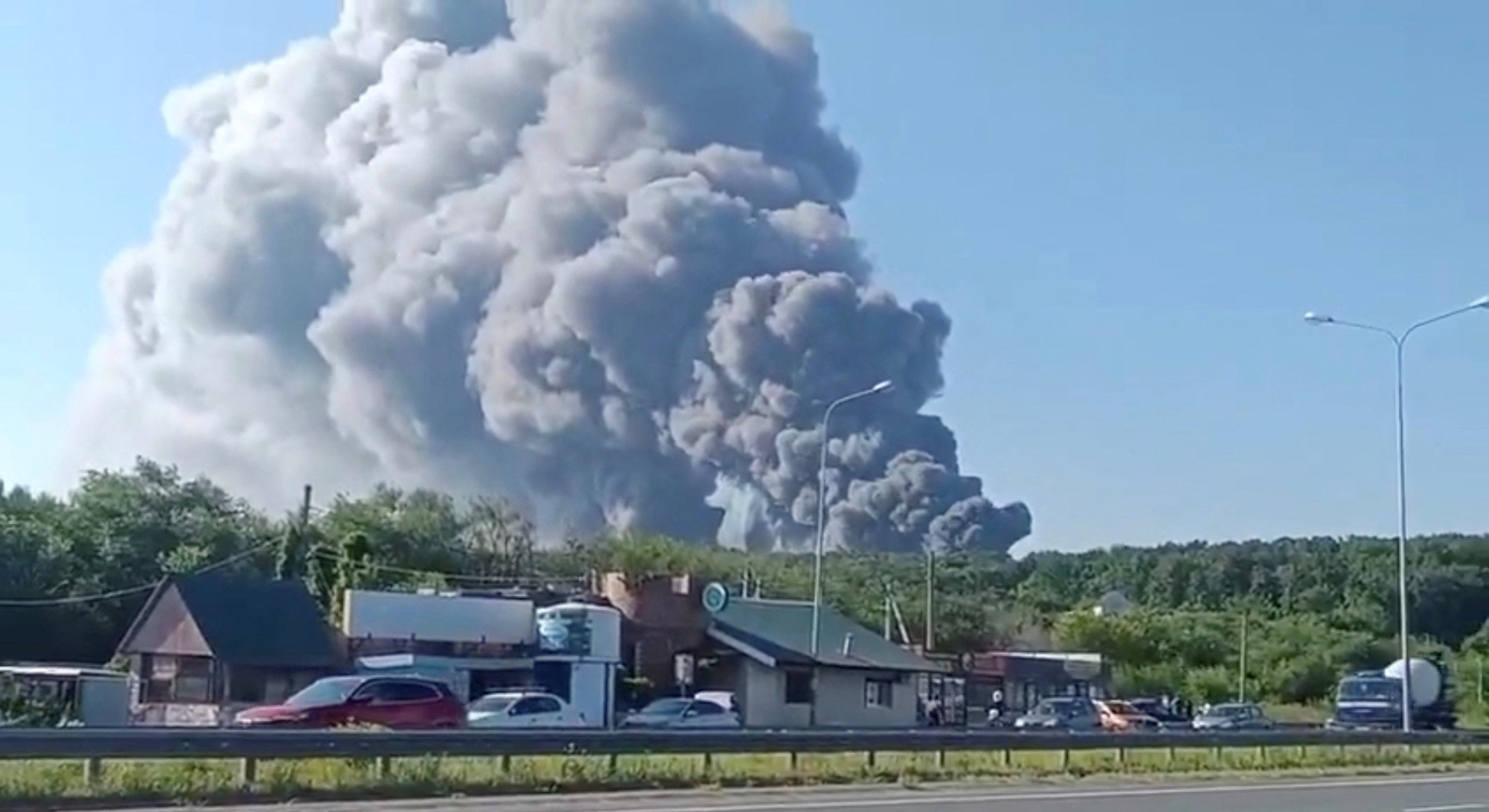 Smoke rises after a Ukrainian drone attack on a Wildberries warehouse (Reuters)