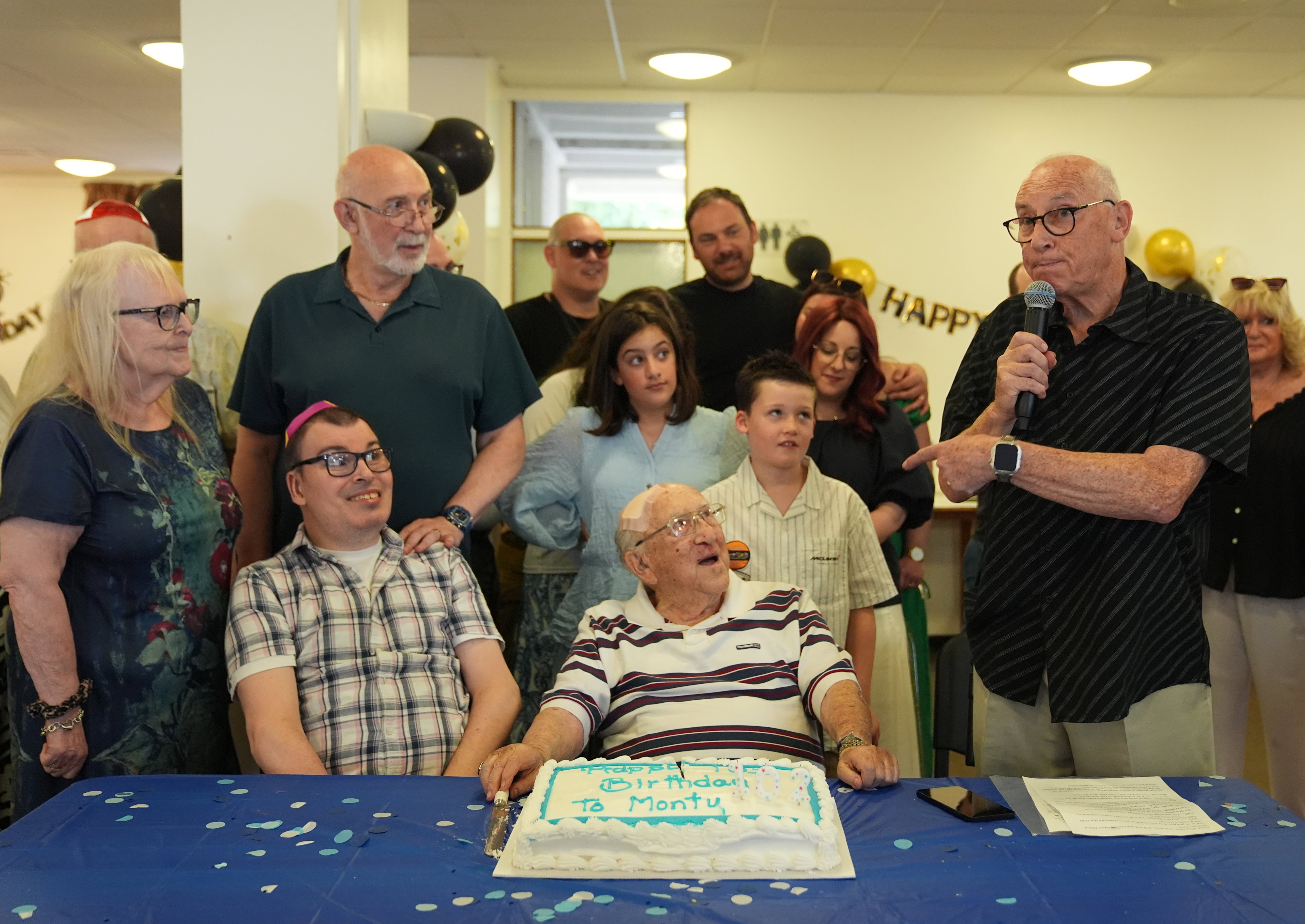 He was joined by members of his family on Sunday after turning 102 (Maja Smiejkowska/PA) (PA Wire)
