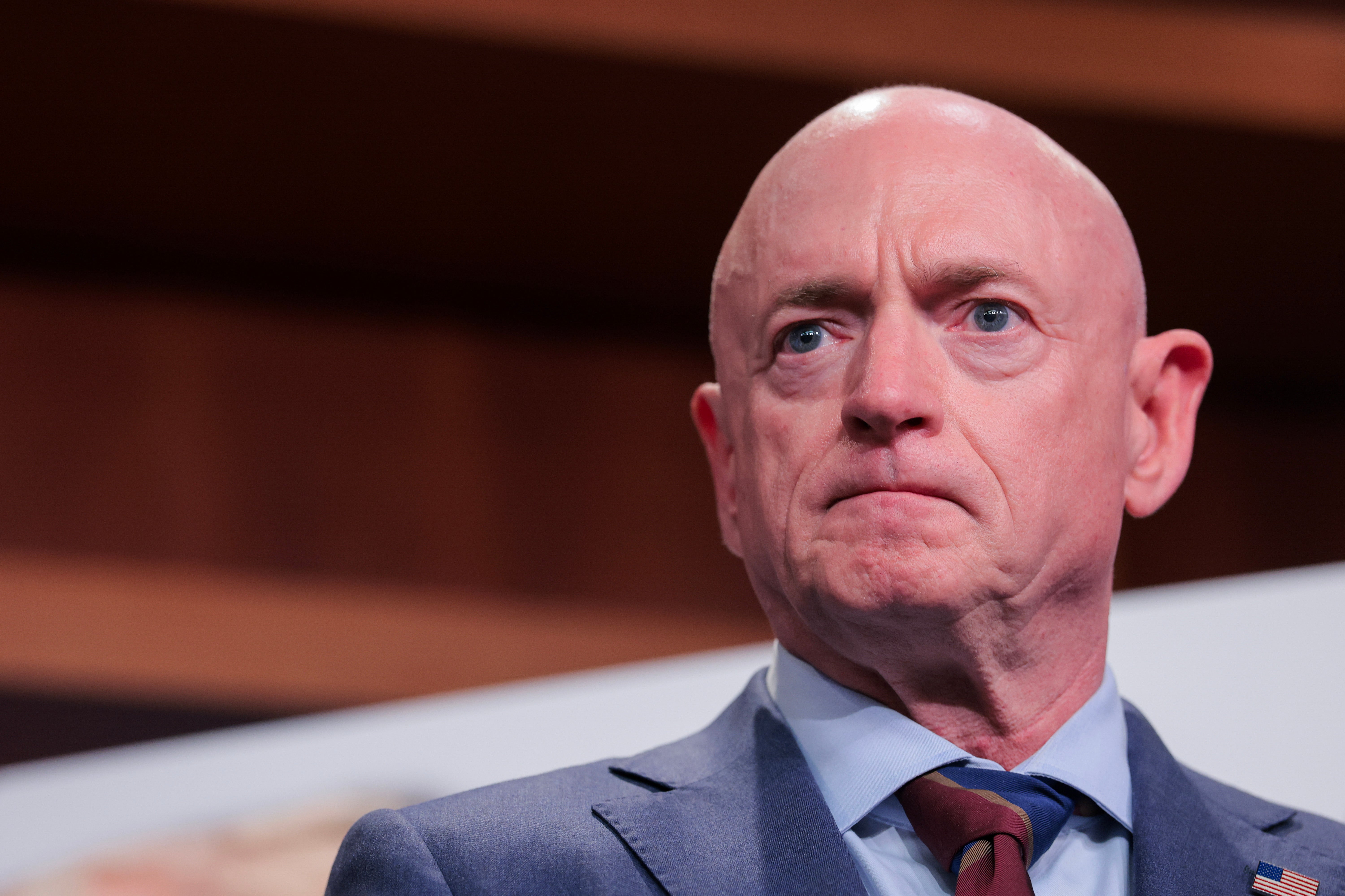 Sen. Mark Kelly urged Donald Trump to ditch his two top negotiators on Sunday