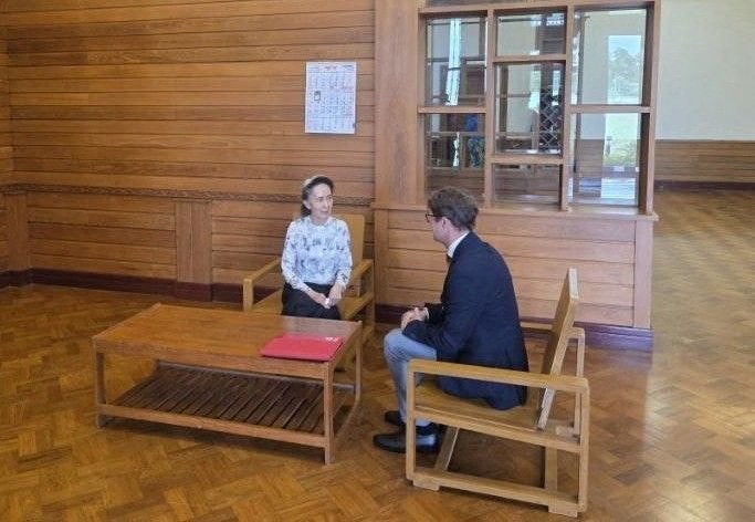 Aung San Suu Kyi meets Red Cross representative Arnaude de Baecque in Naypyidaw in this picture provided by Myanmar government spokesperson Khine Khine Soe on 3 August 2026