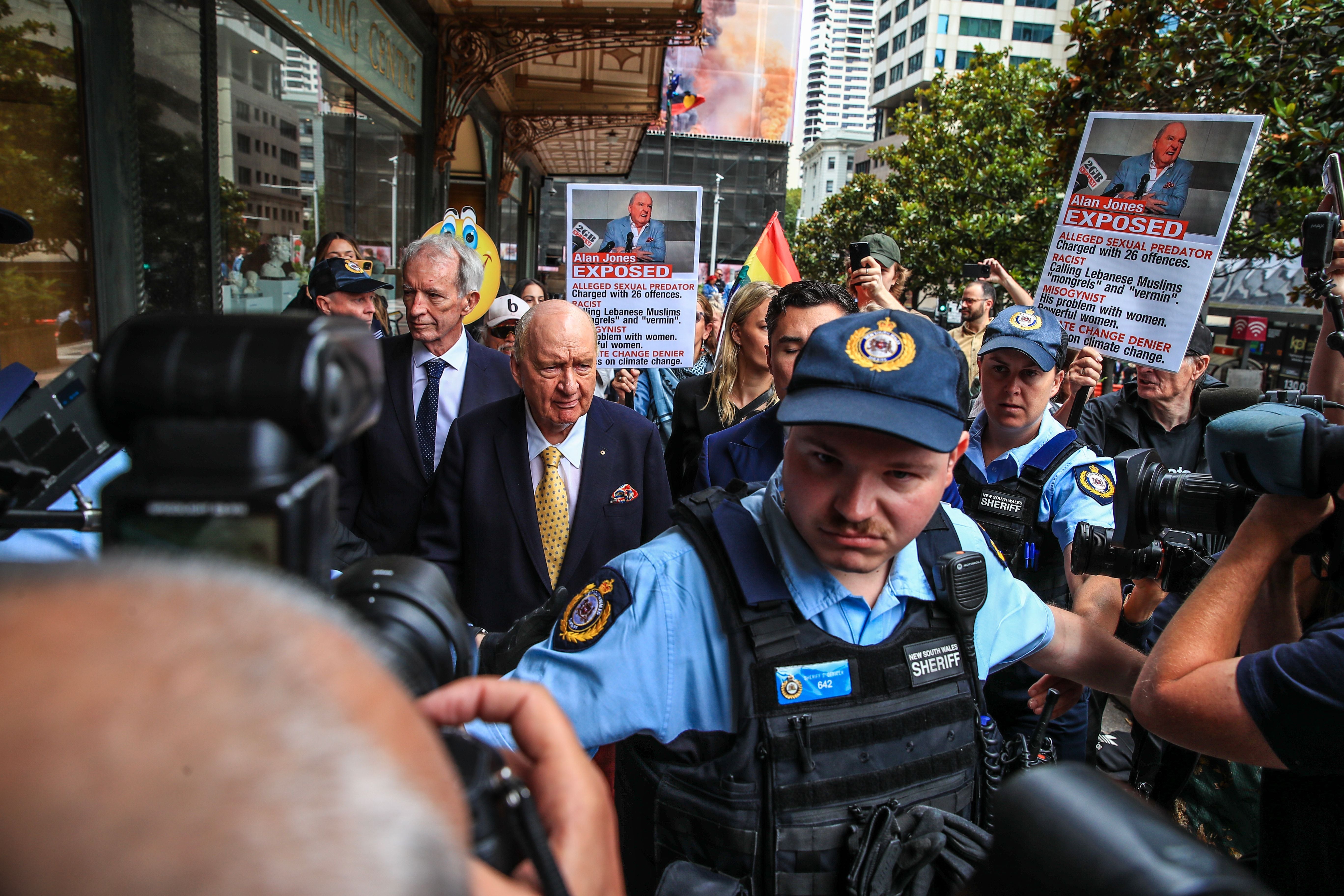 Protesters outside an earlier court hearing
