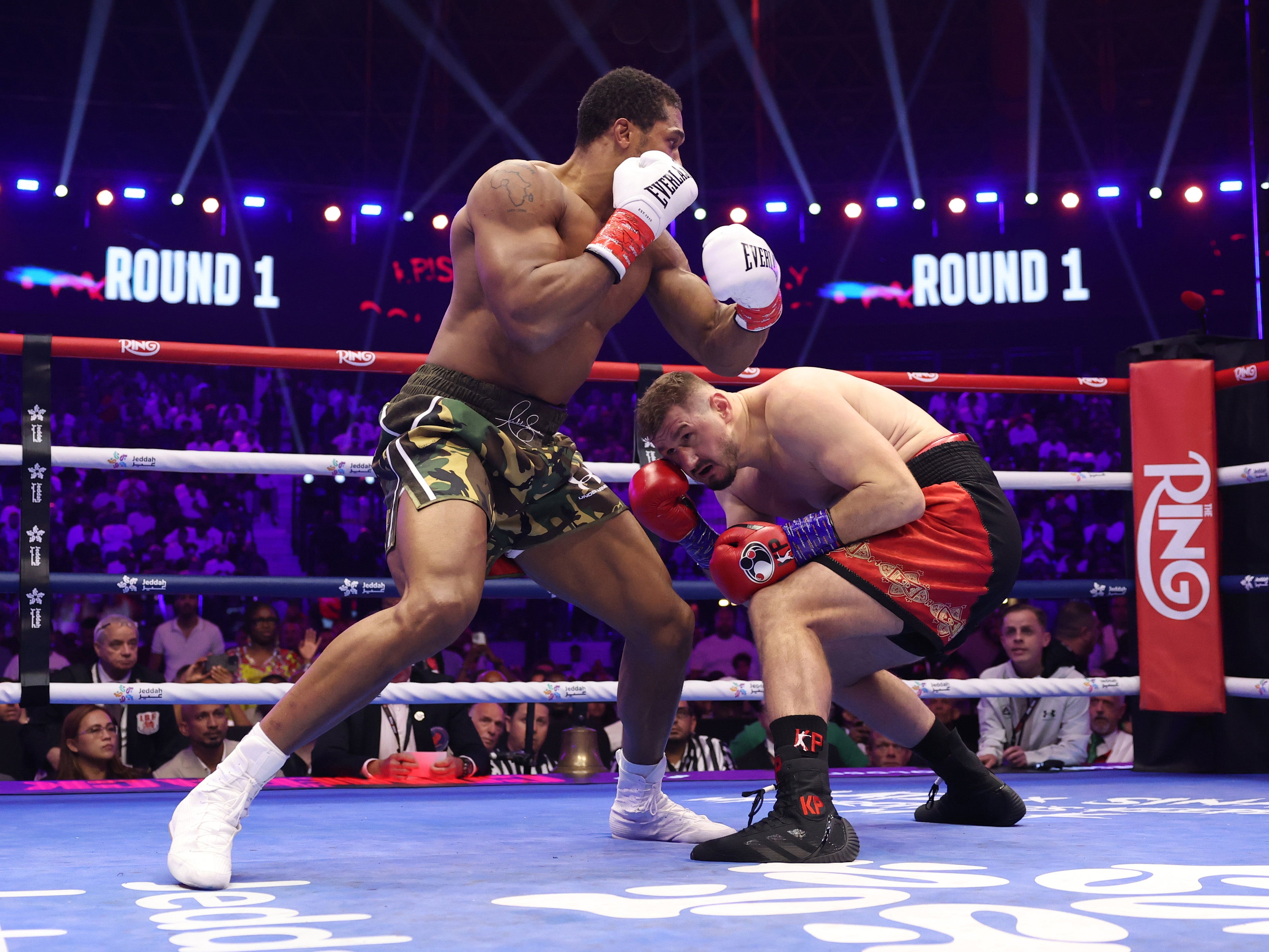 Anthony Joshua (left) stopped Kristian Prenga in round two