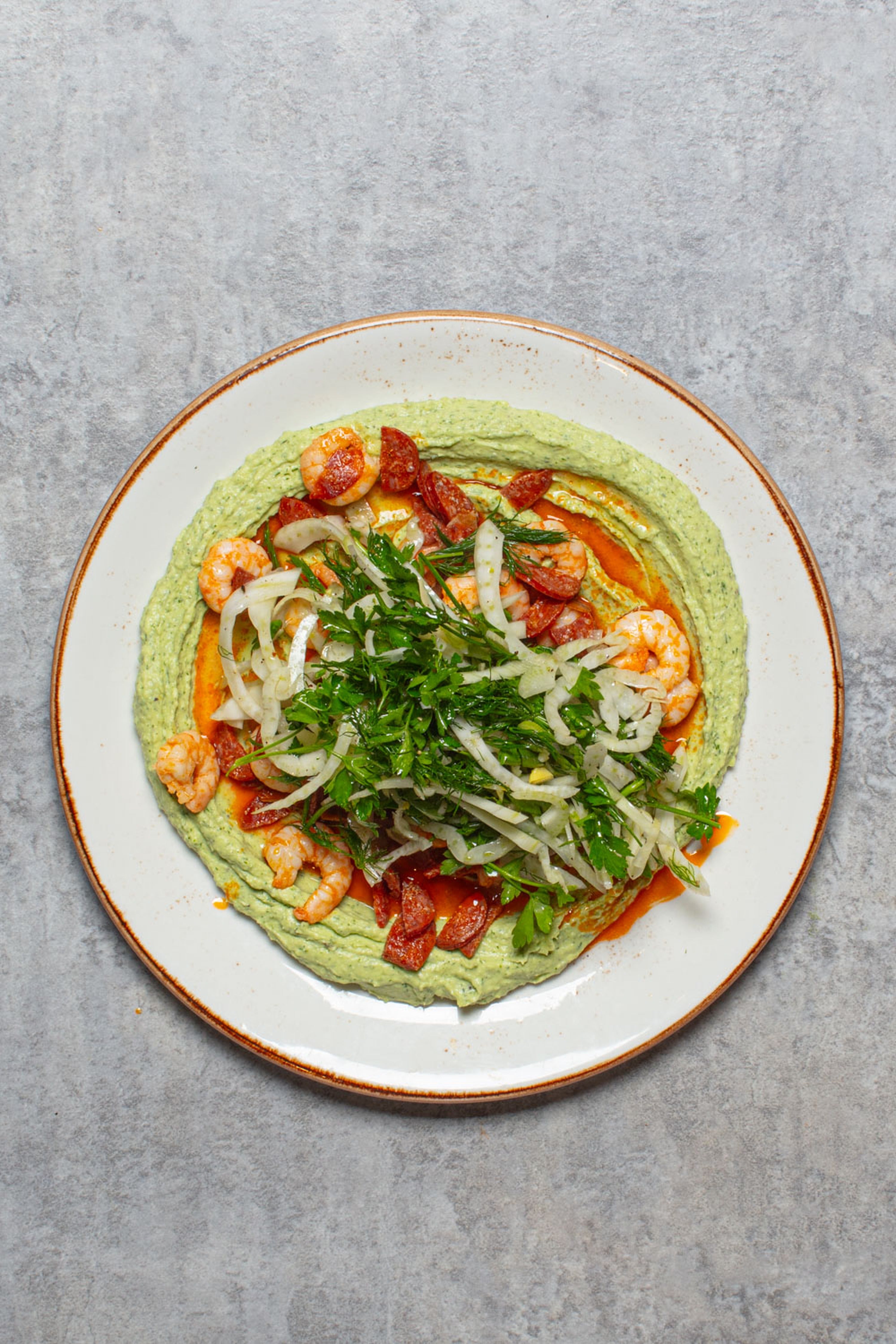 Smoky chorizo and juicy prawns meet a creamy butter bean and feta base