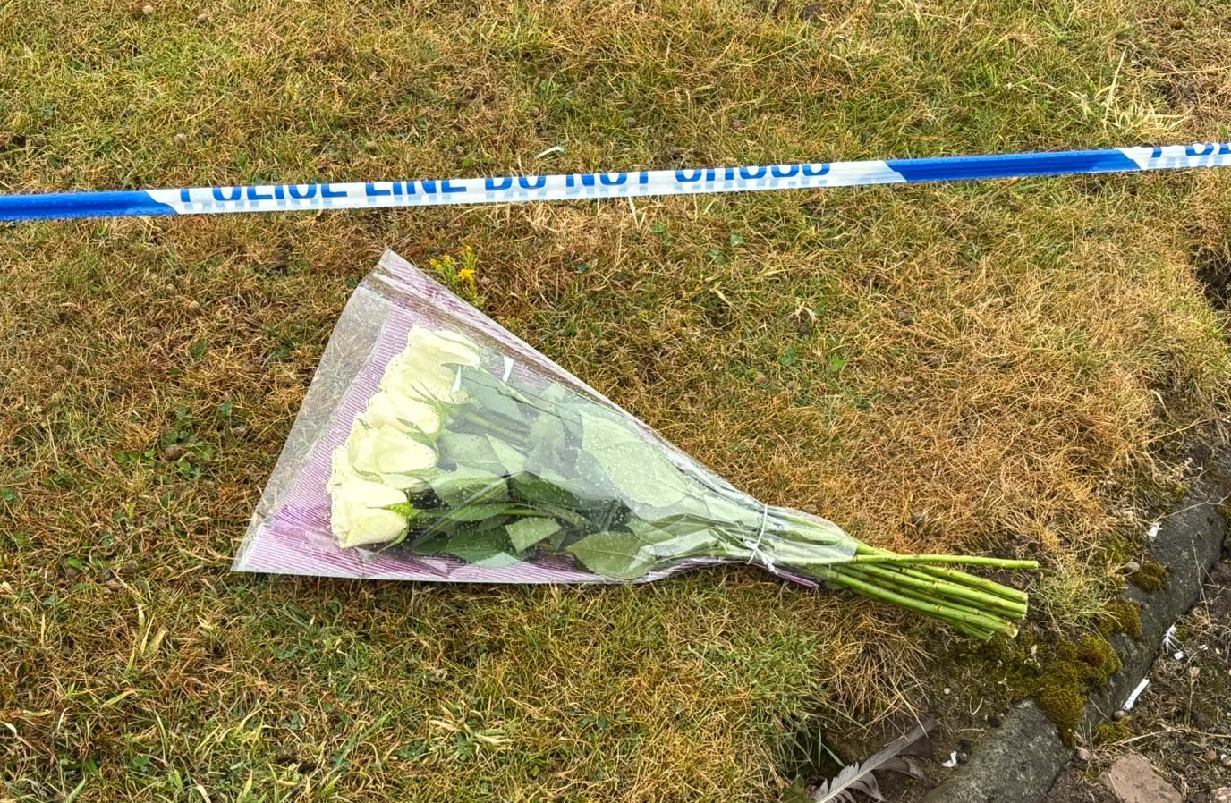 Floral tributes at the Elliot Industrial Estate in Arbroath (Rachel Keenan/PA) (PA Wire)