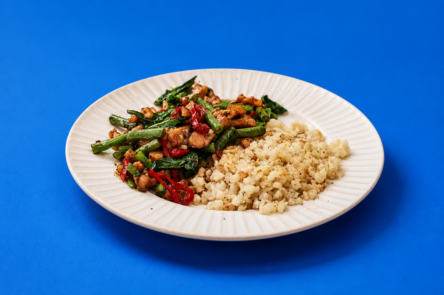 A lighter take on the Thai favourite, with fragrant basil, chilli and cauliflower rice