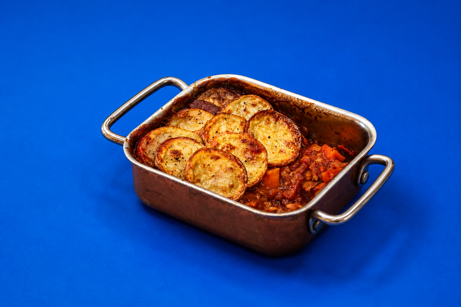 Green lentils help stretch the beef without losing the comfort of a classic hotpot