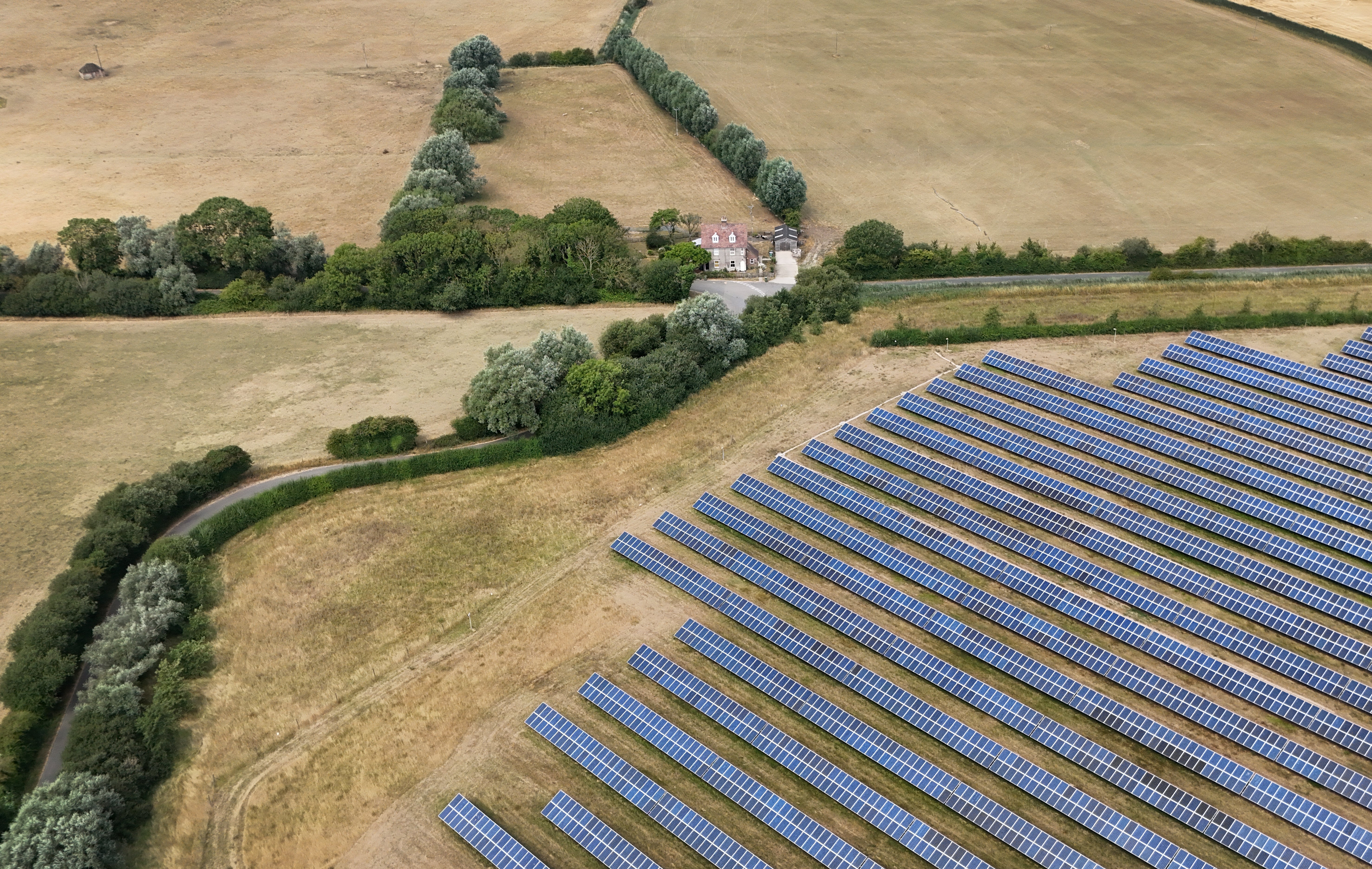 July was also the sunniest on record for the UK, with solar power hitting new record monthly highs (Gareth Fuller/PA)