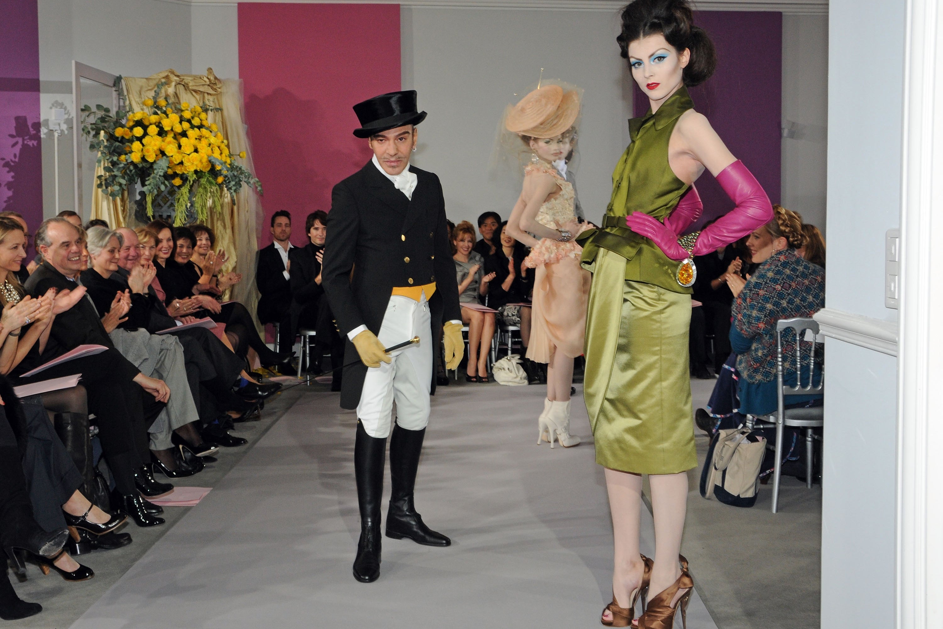 John Galliano, pictured here onstage on the Dior runway in January 2010, lost his position at the fashion house after his antisemitic comments surfaced (Getty)