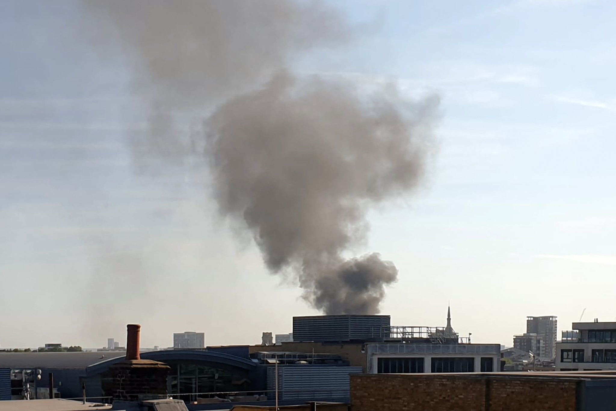 Residents evacuated after fire breaks out at east London flats