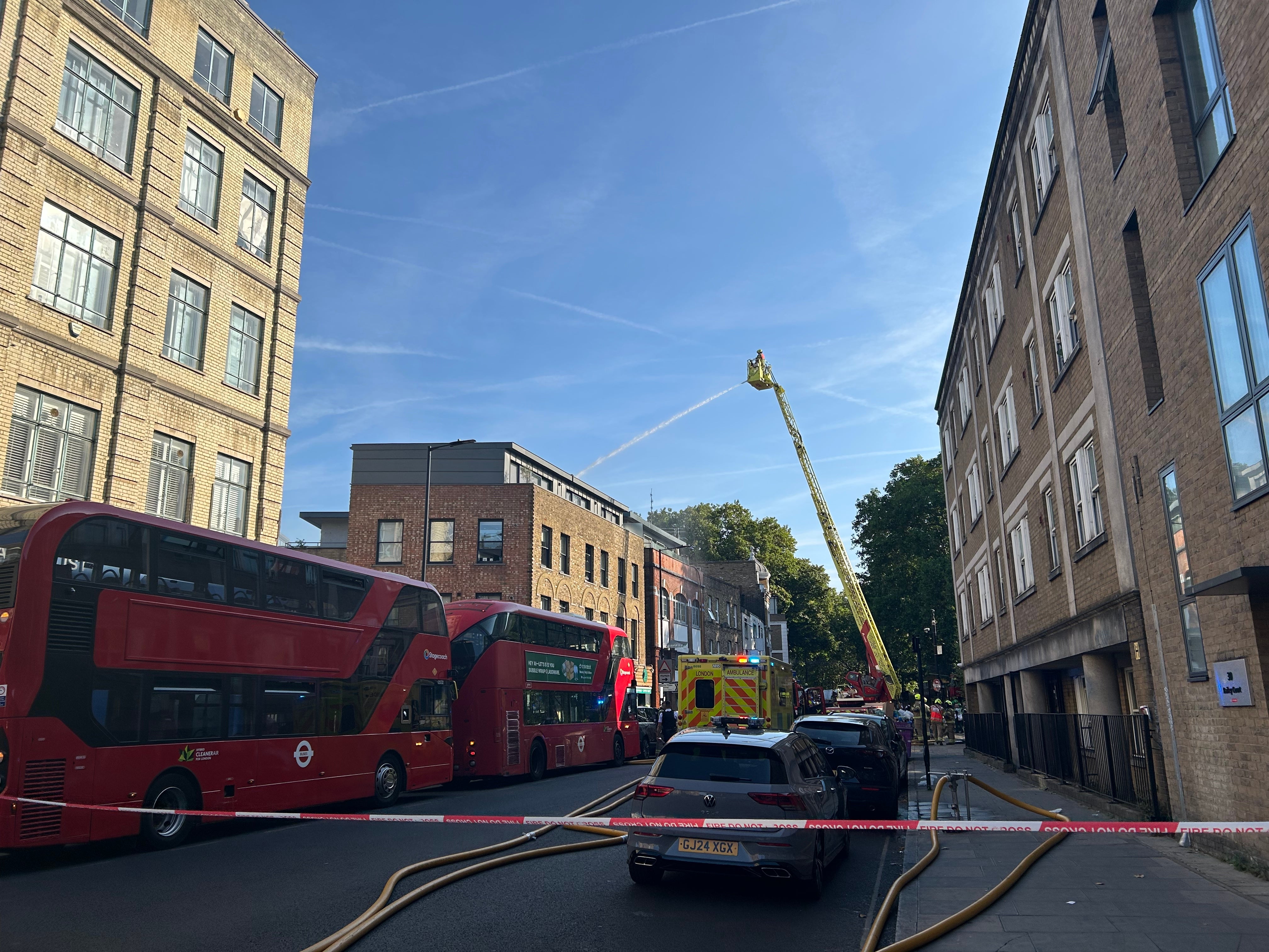 Smoke seen across central London after fire breaks out at flats in Shoreditch&nbsp;