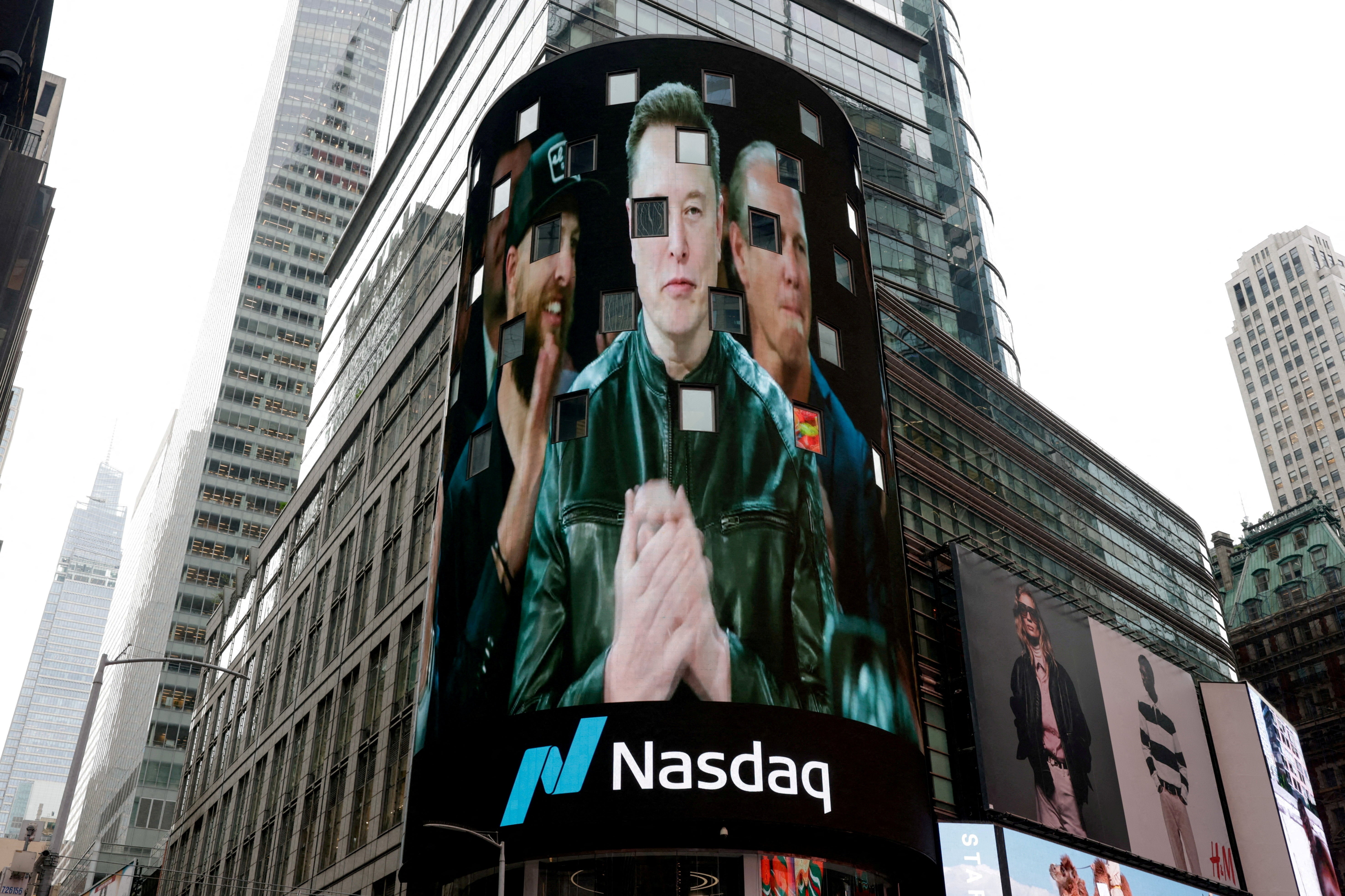 A live feed shows SpaceX CEO Elon Musk on the day of SpaceX's initial public offering (IPO) at the Nasdaq MarketSite, in New York City on June 12