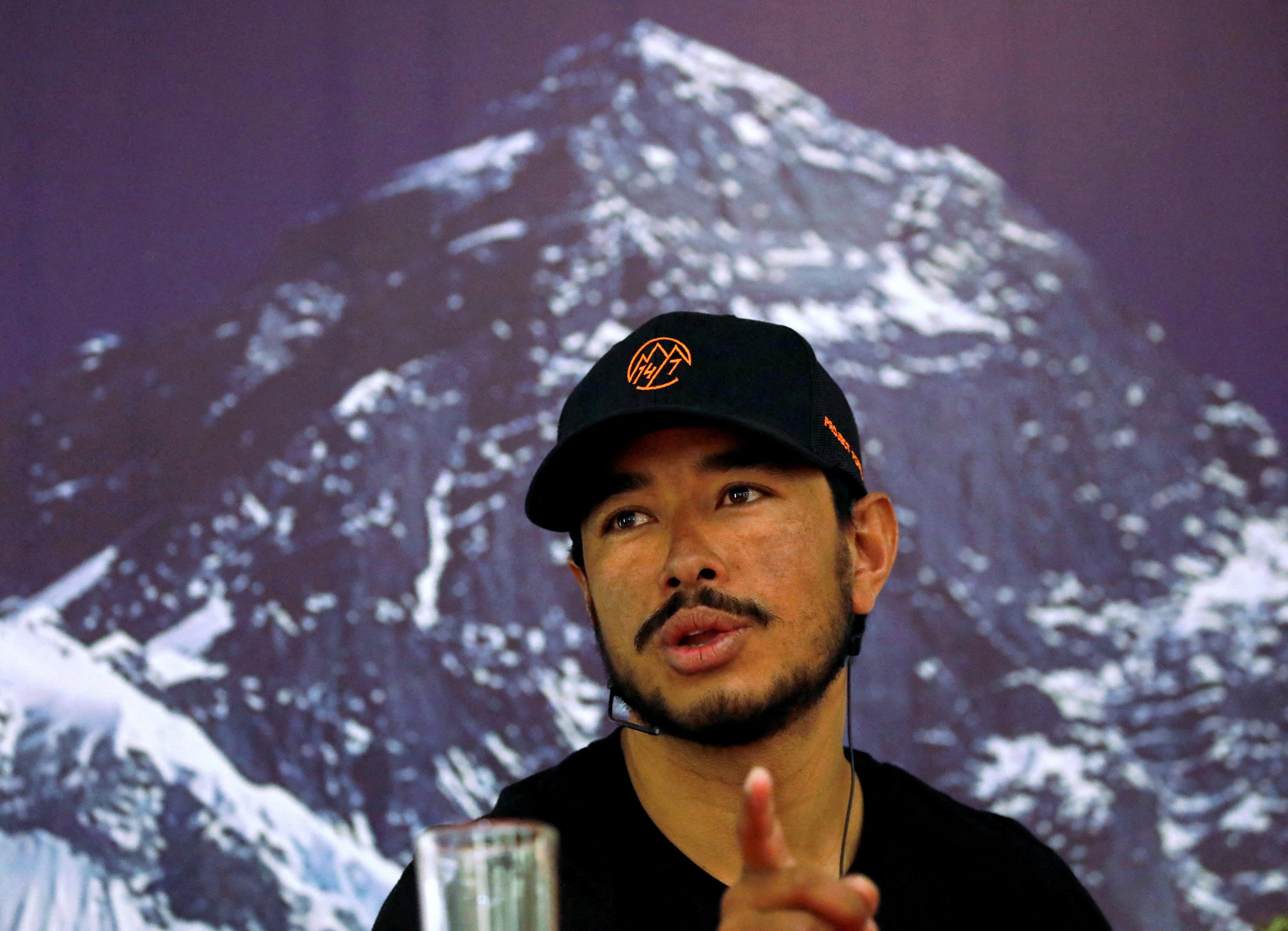 Nirmal Purja speaks at a news conference after climbing Mount Everest on 28 May 2019 (Reuters)