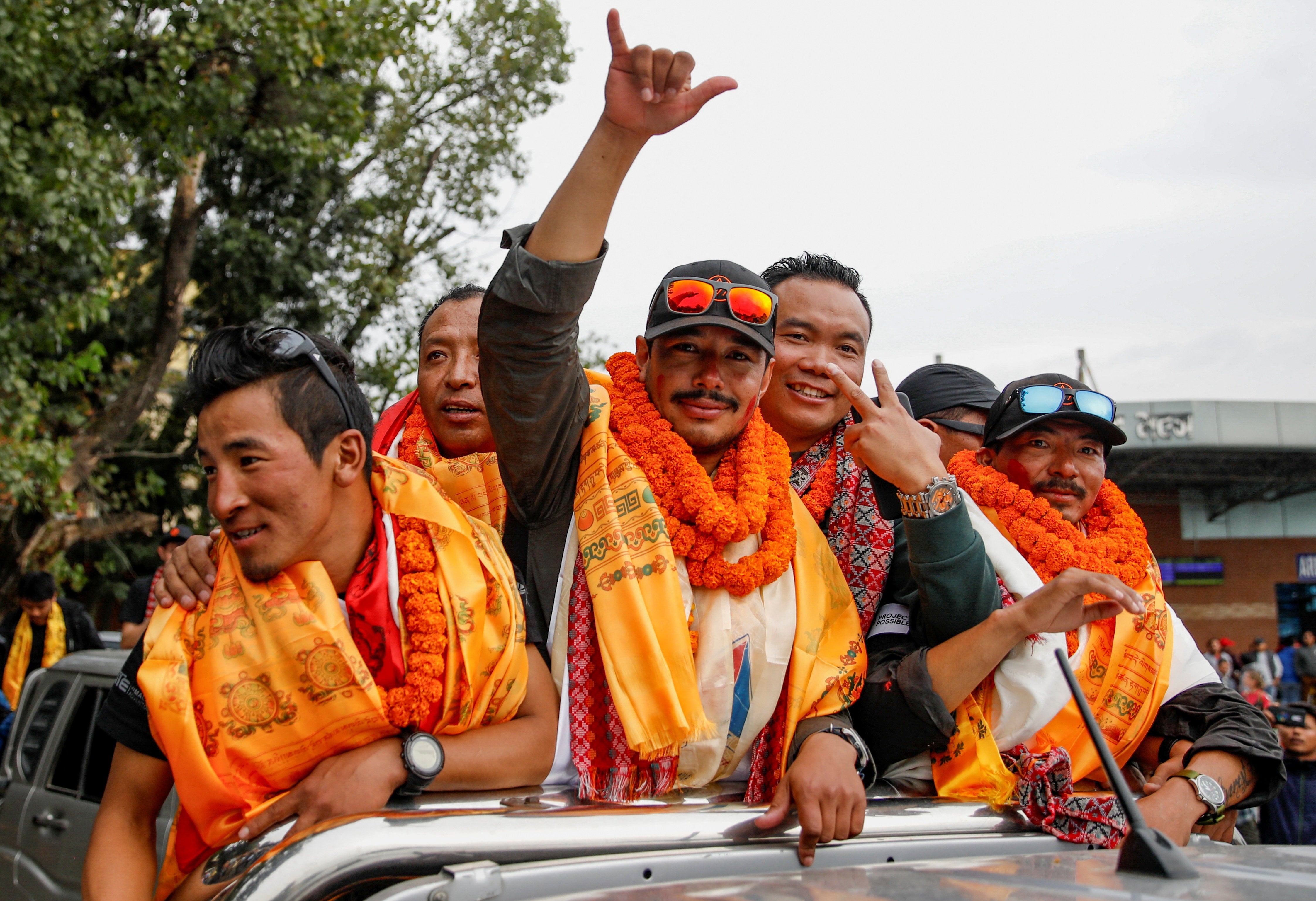 Nirmal Purja arrives in Kathmandu, Nepal, after climbing all of the world's 14 highest peaks (Reuters)