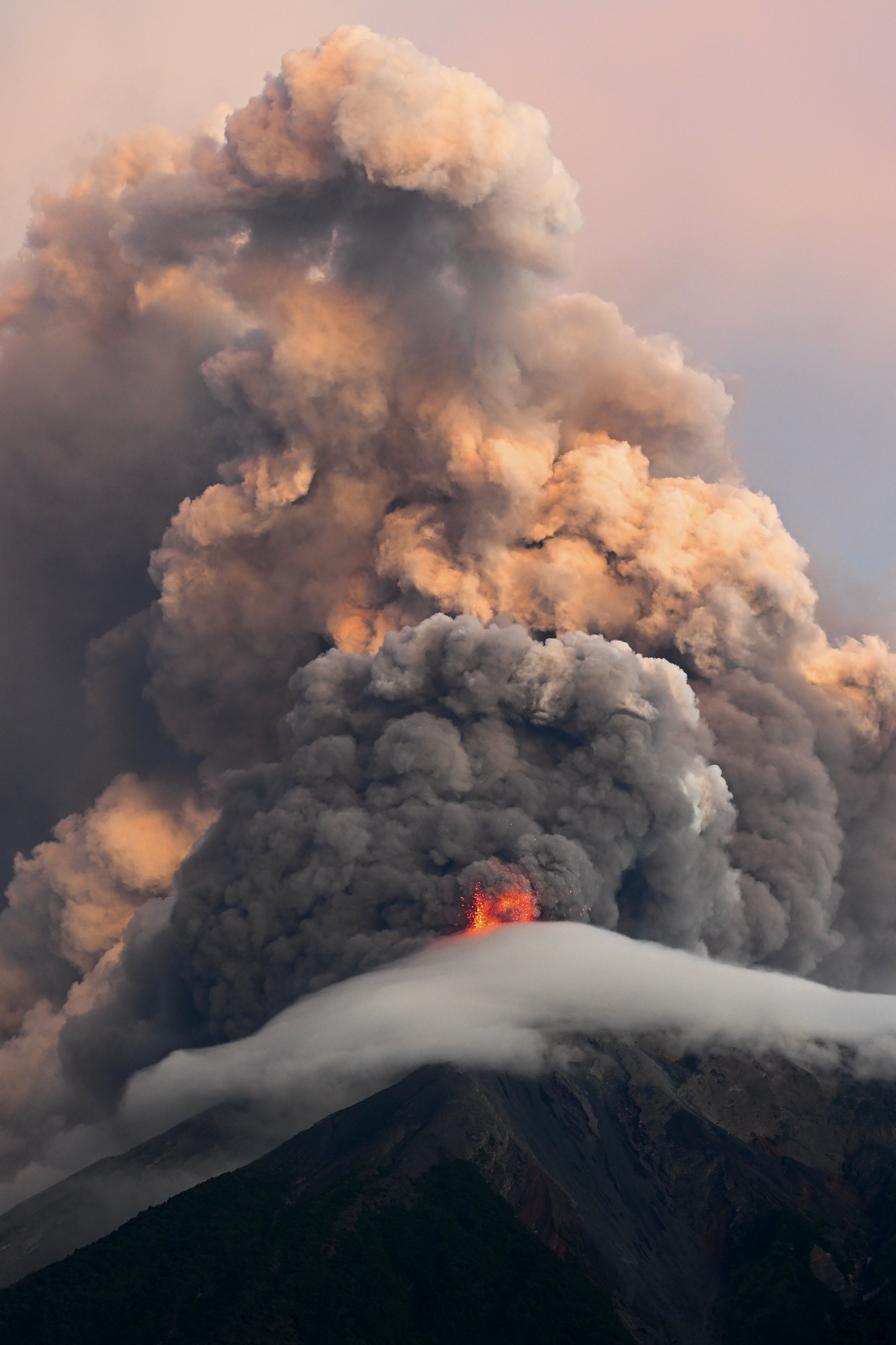 The 12,346-foot volcano has been in near-continuous eruption since 2002, though records of its activity date back to the 1500s (AFP/Getty)