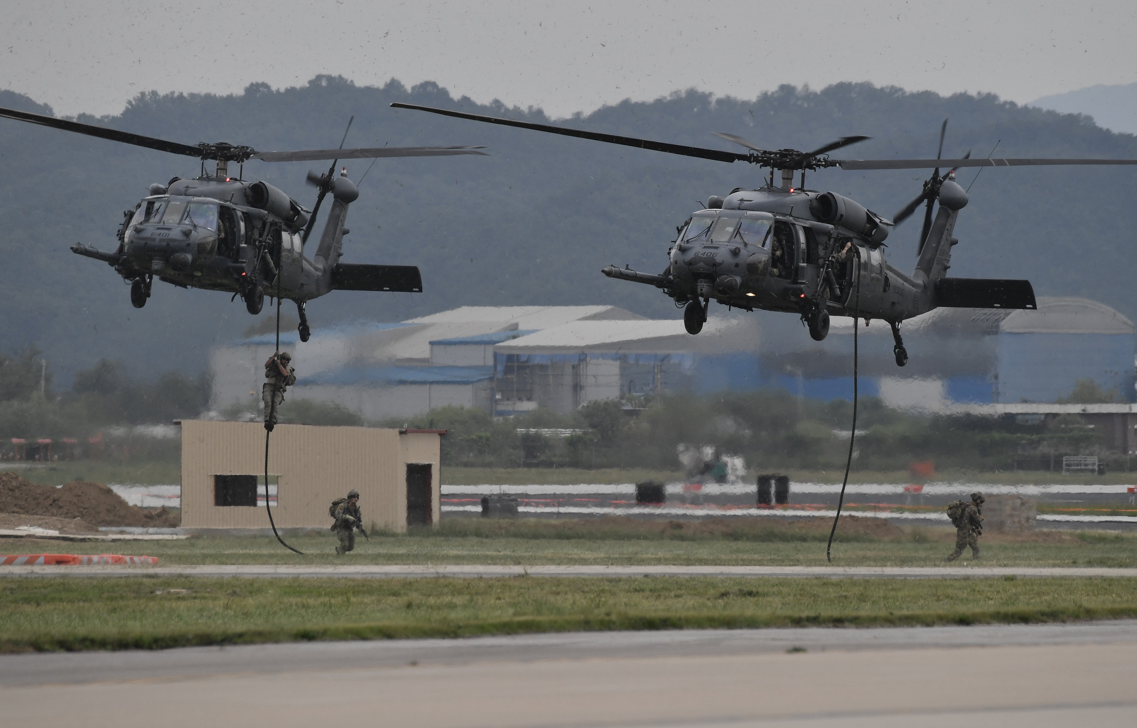 Students detained after breaking into US military base while shouting anti-US slogans, police say